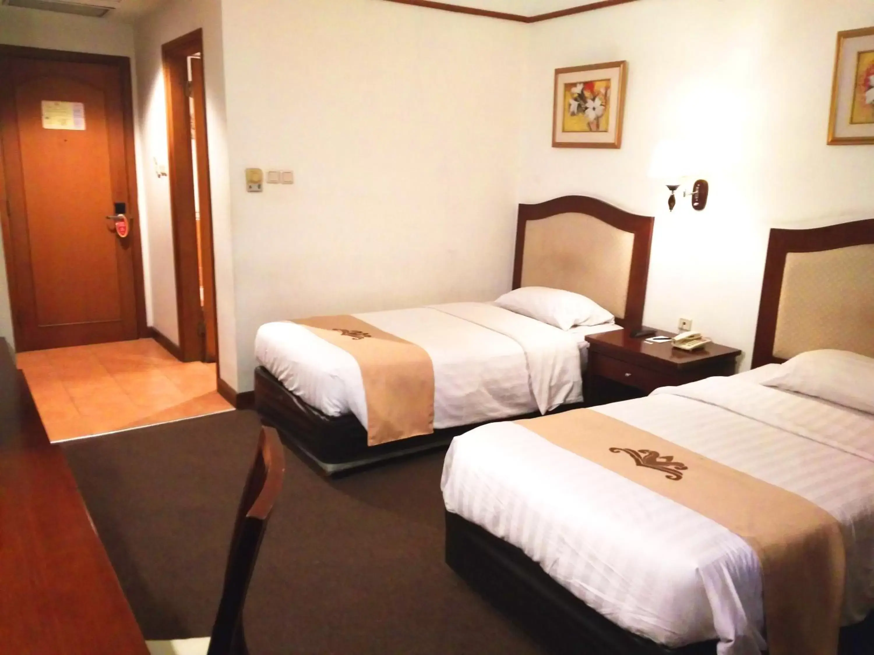 Bed in Grand Pasundan Convention Hotel