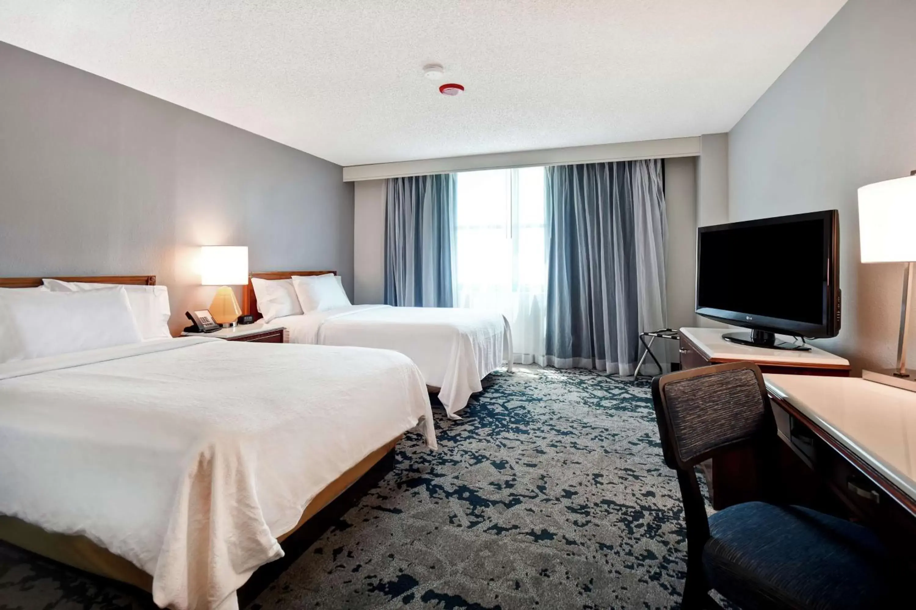 Bedroom, TV/Entertainment Center in Embassy Suites Montgomery - Hotel & Conference Center