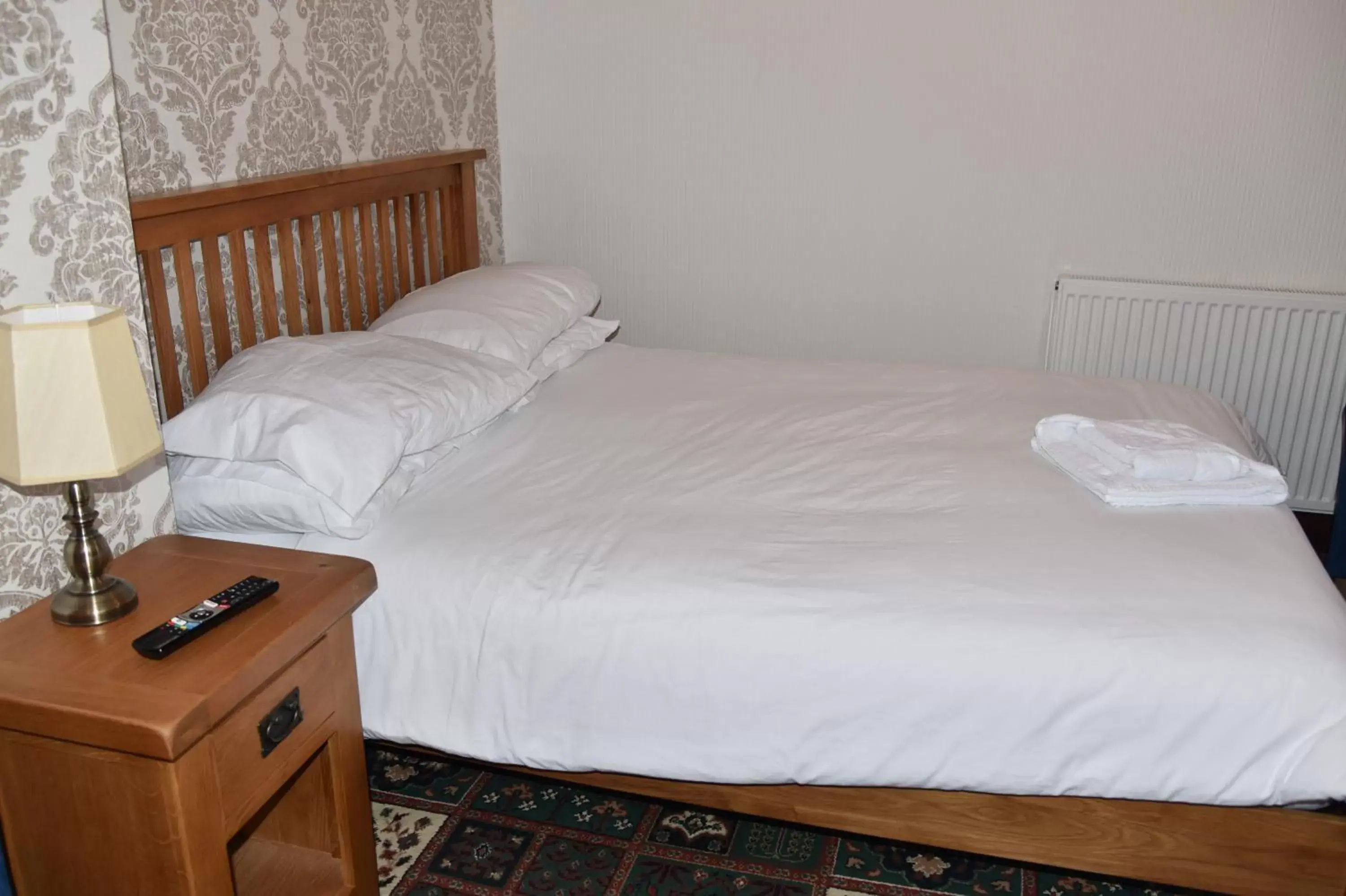 Bed in Dinorben Arms Hotel