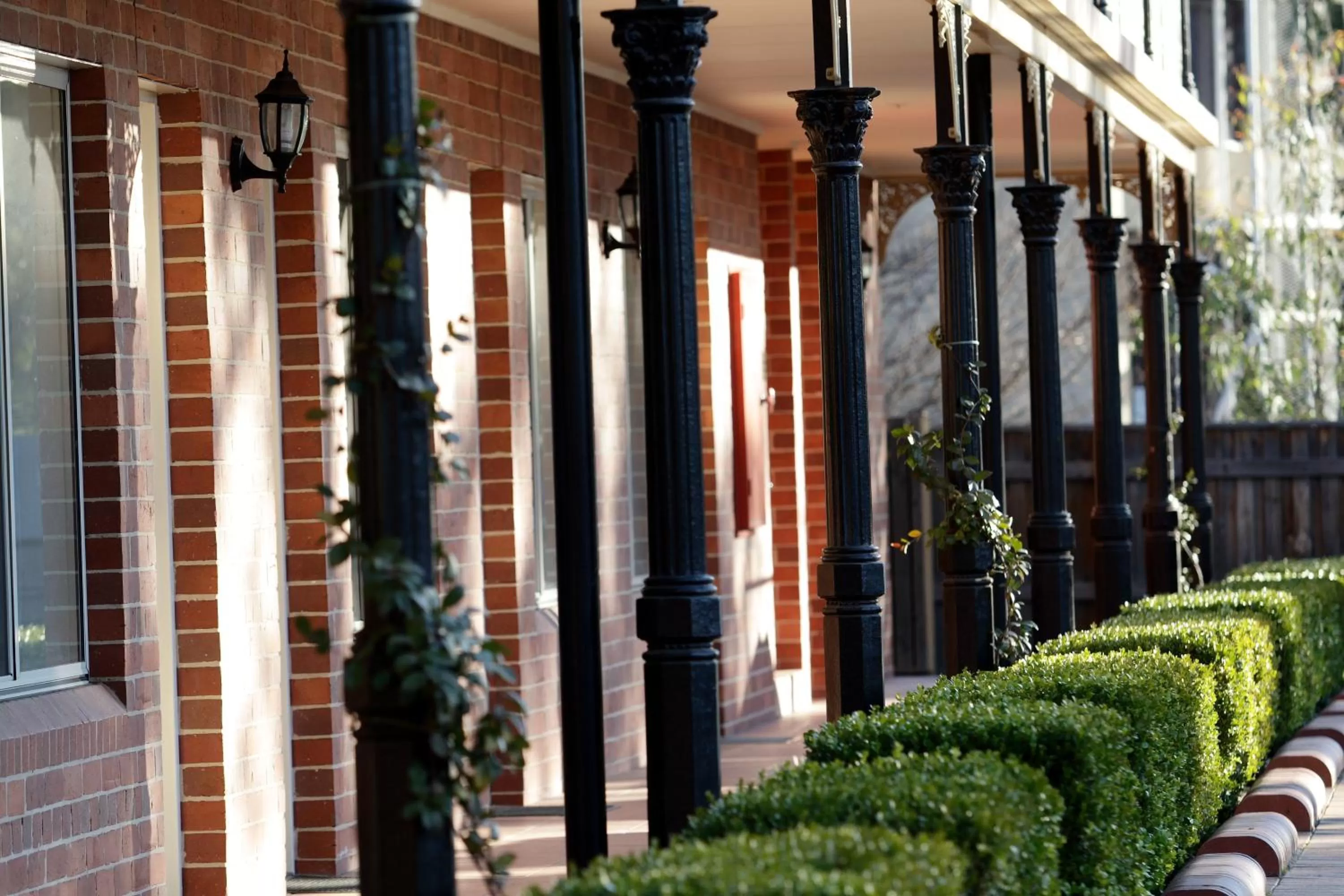 Facade/entrance in Carlyle Suites & Apartments