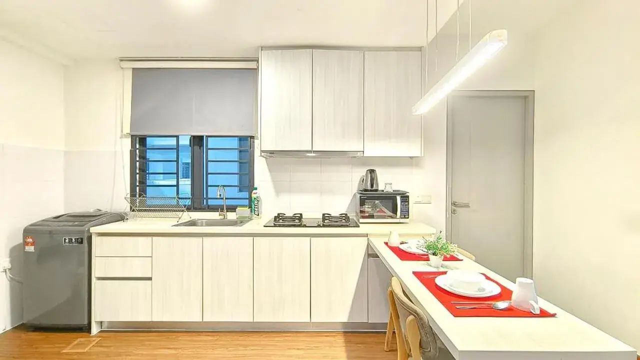 Kitchen/Kitchenette in 1 Tebrau Suites by Subhome