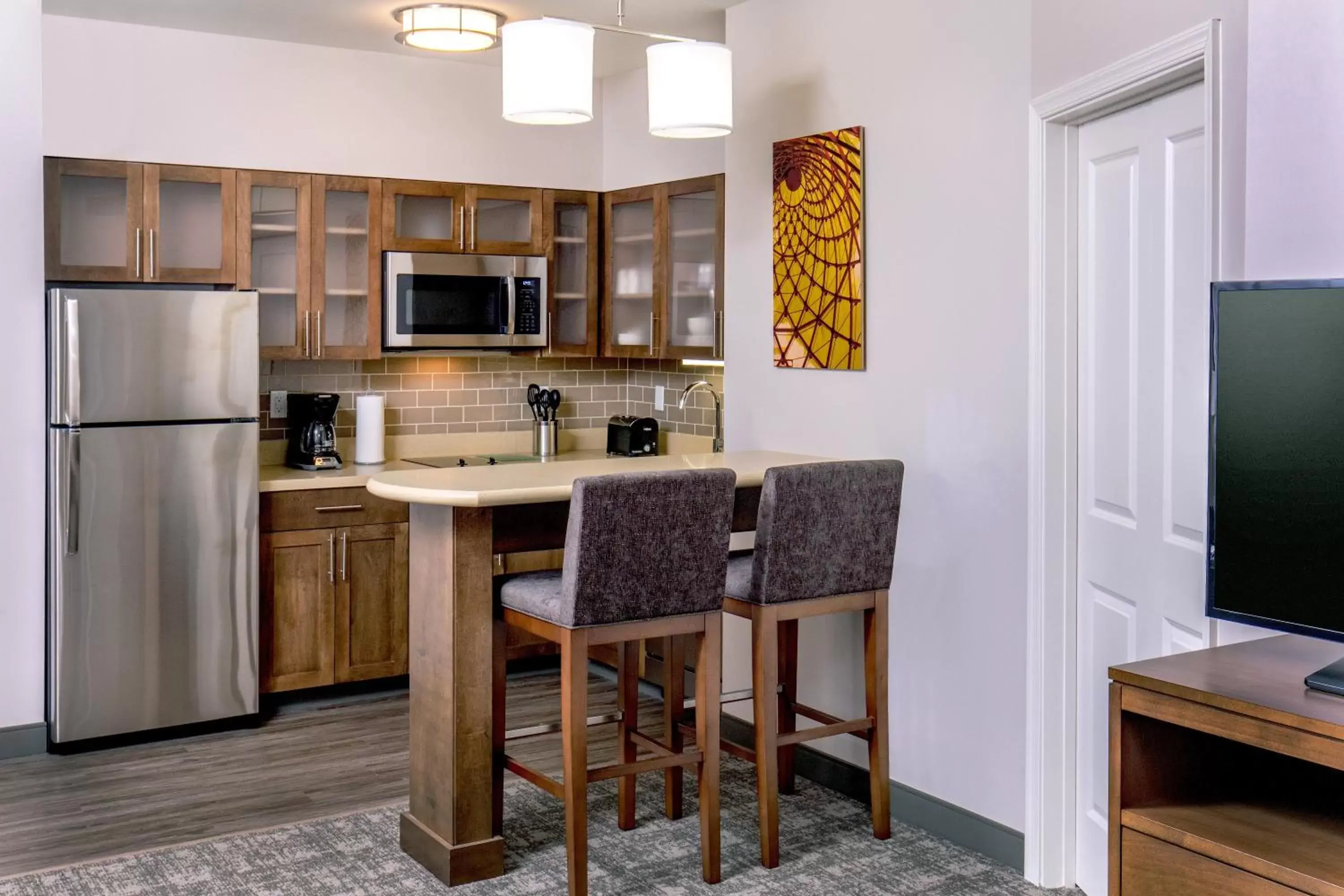 Photo of the whole room, Kitchen/Kitchenette in Staybridge Suites Charlottesville Airport, an IHG Hotel