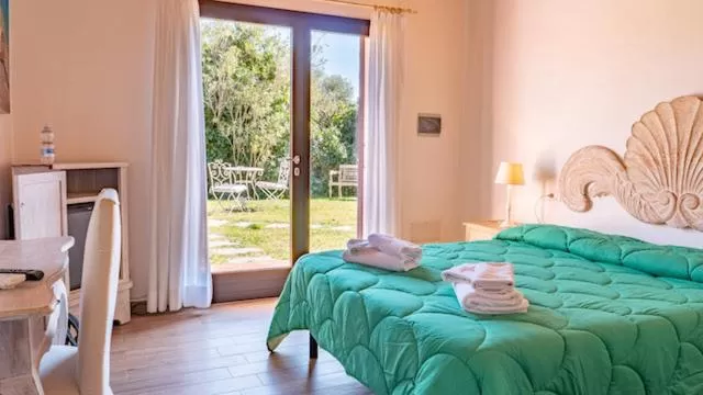 Photo of the whole room, Bed in QUADRIFOGLIO Affittacamere