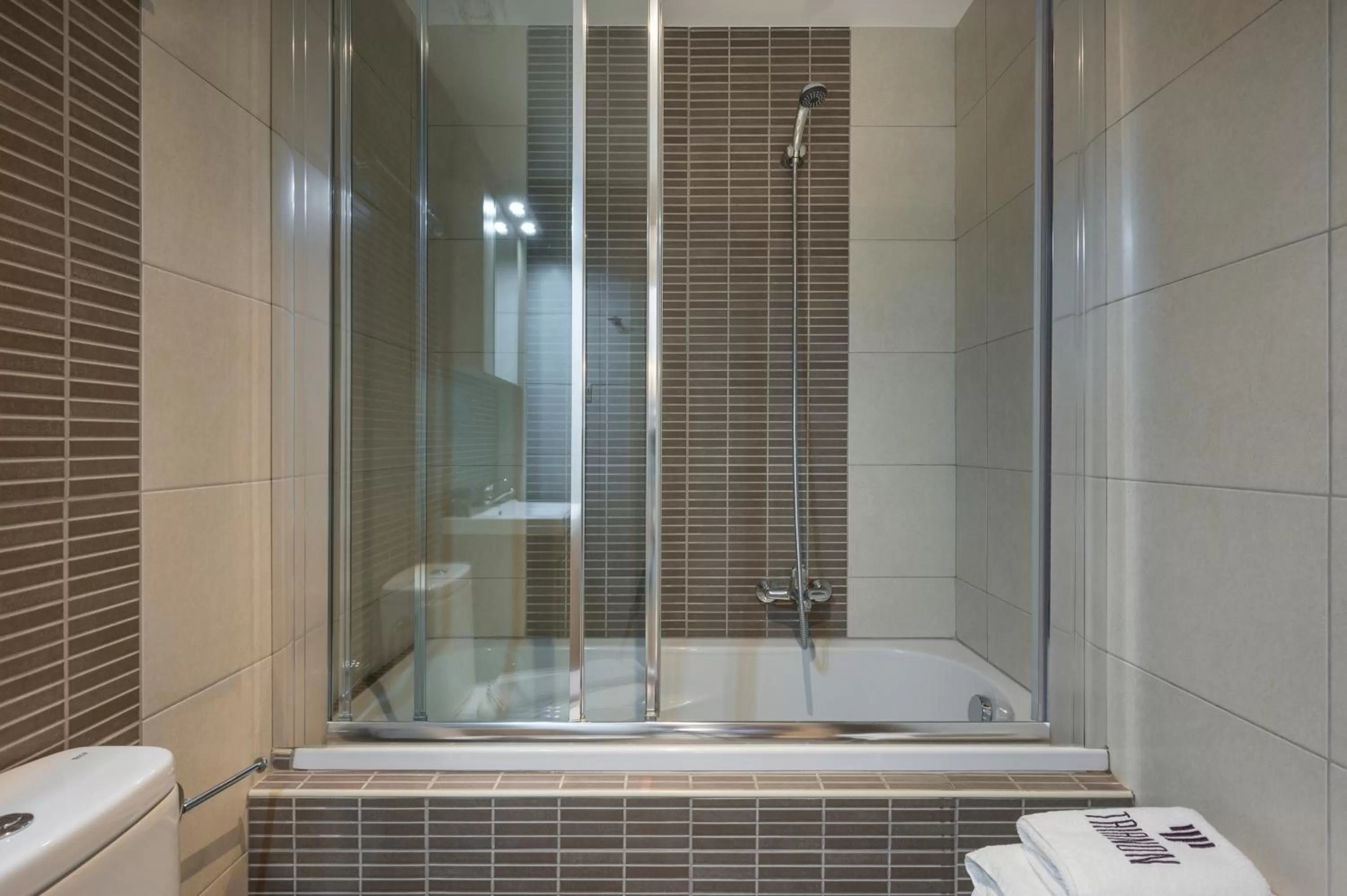Bathroom in Trianon Luxury Apartments & Suites