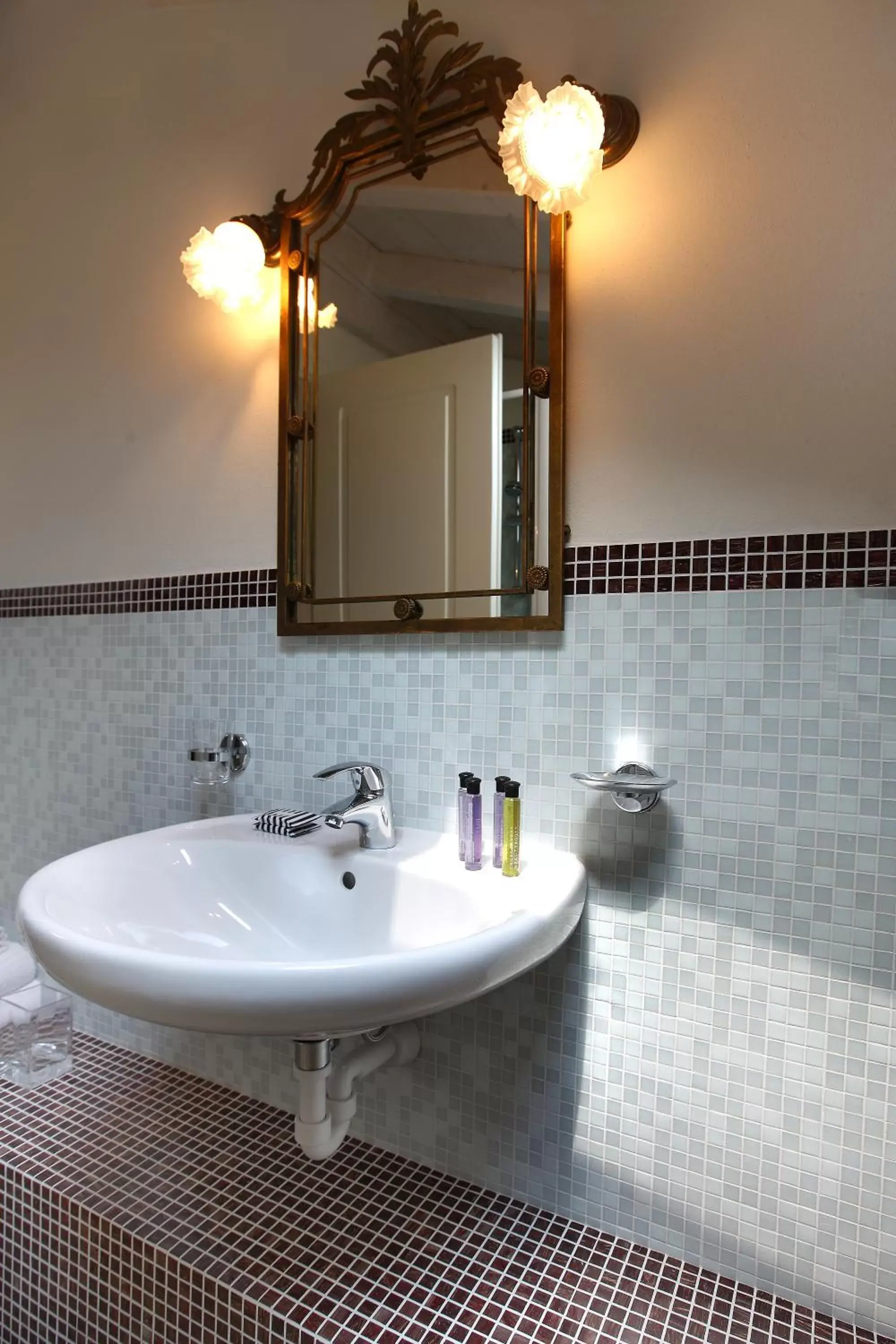 Bathroom in Corte San Luca Apartments