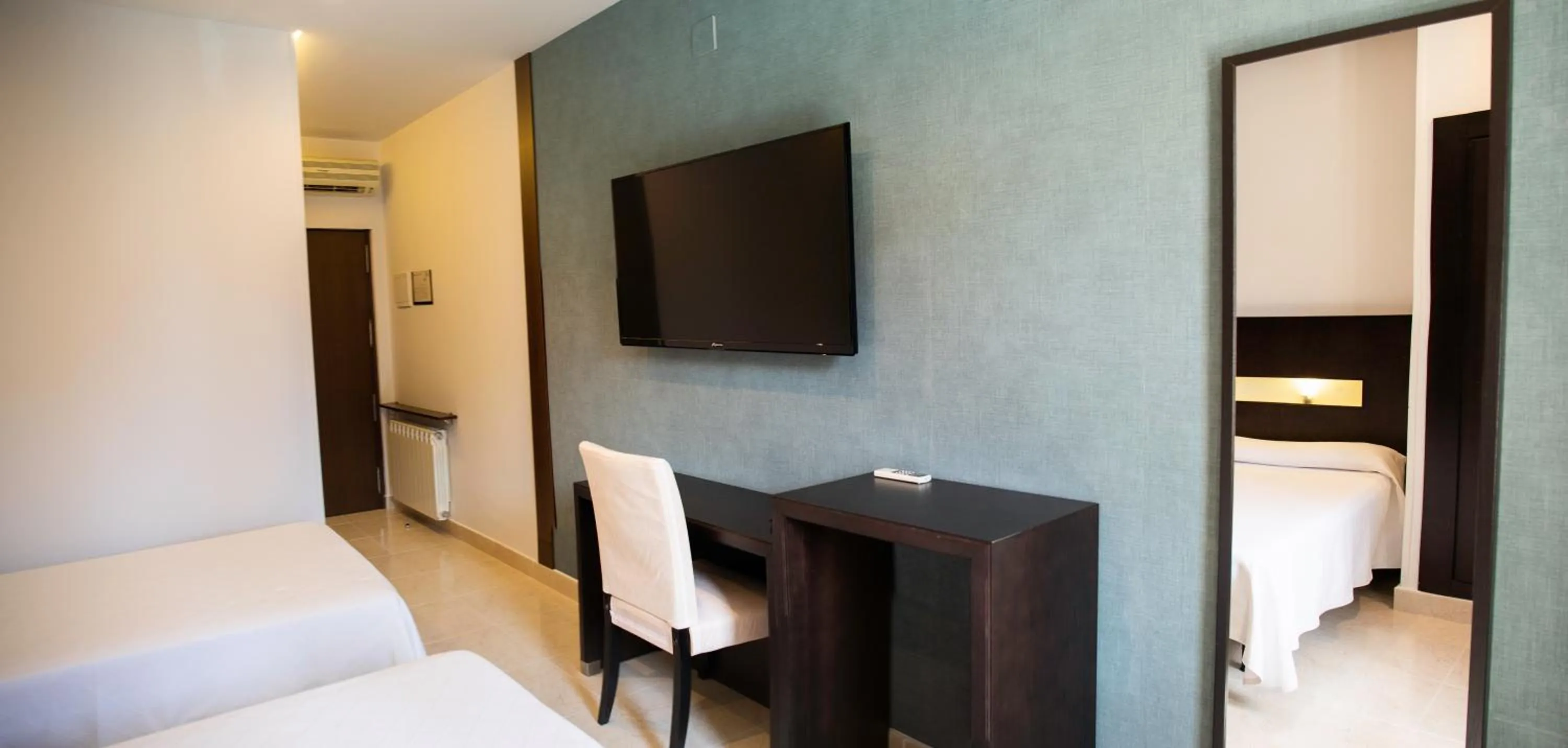 Bed in Hotel El Mesón