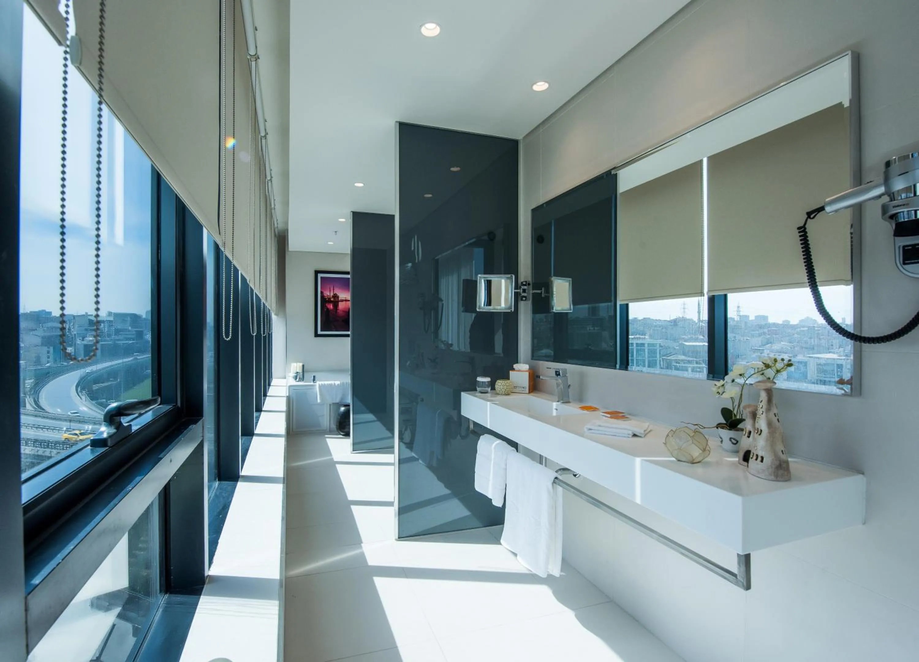 Shower in Centro Westside by Rotana