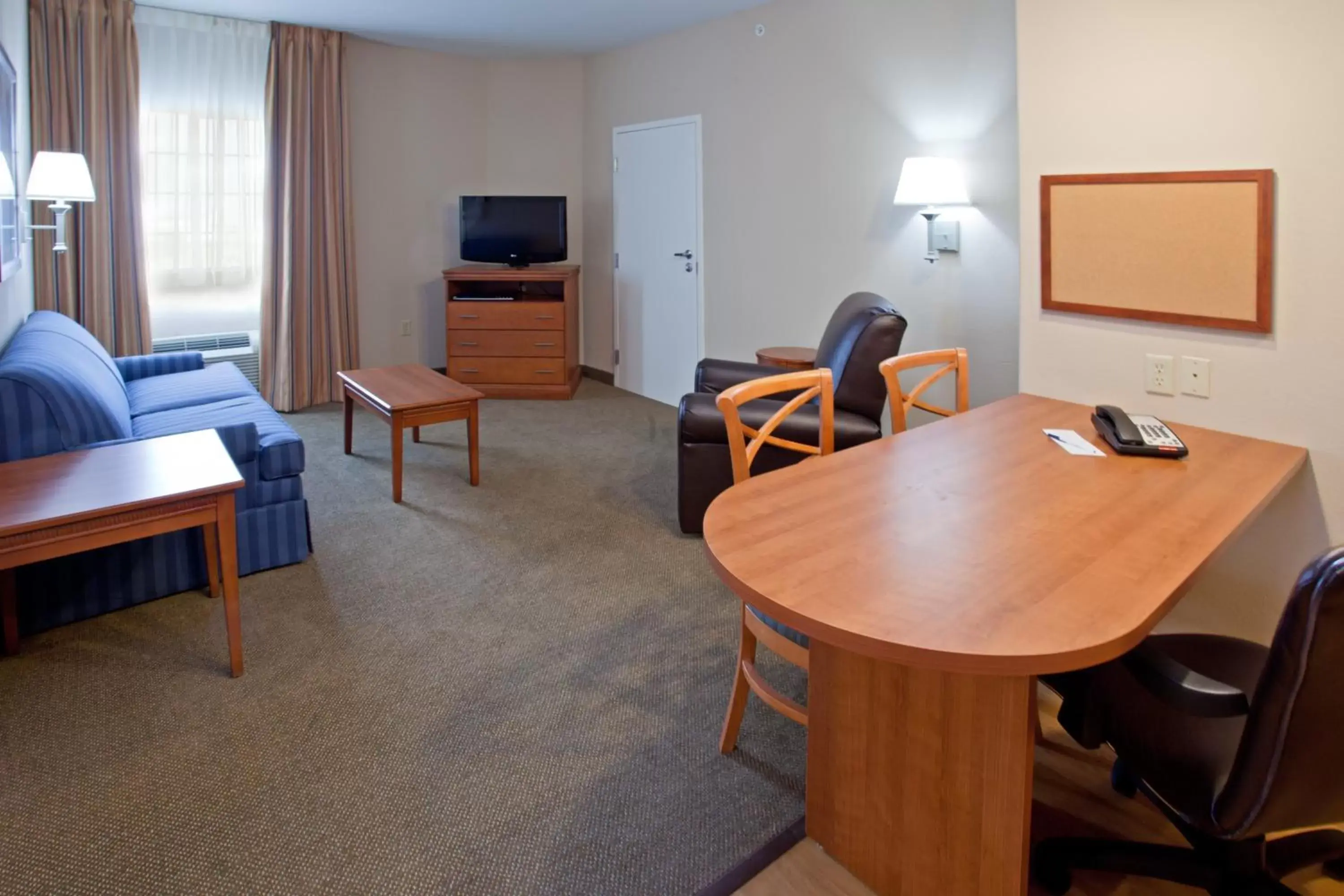 Photo of the whole room, Seating Area in Candlewood Suites League City, an IHG Hotel