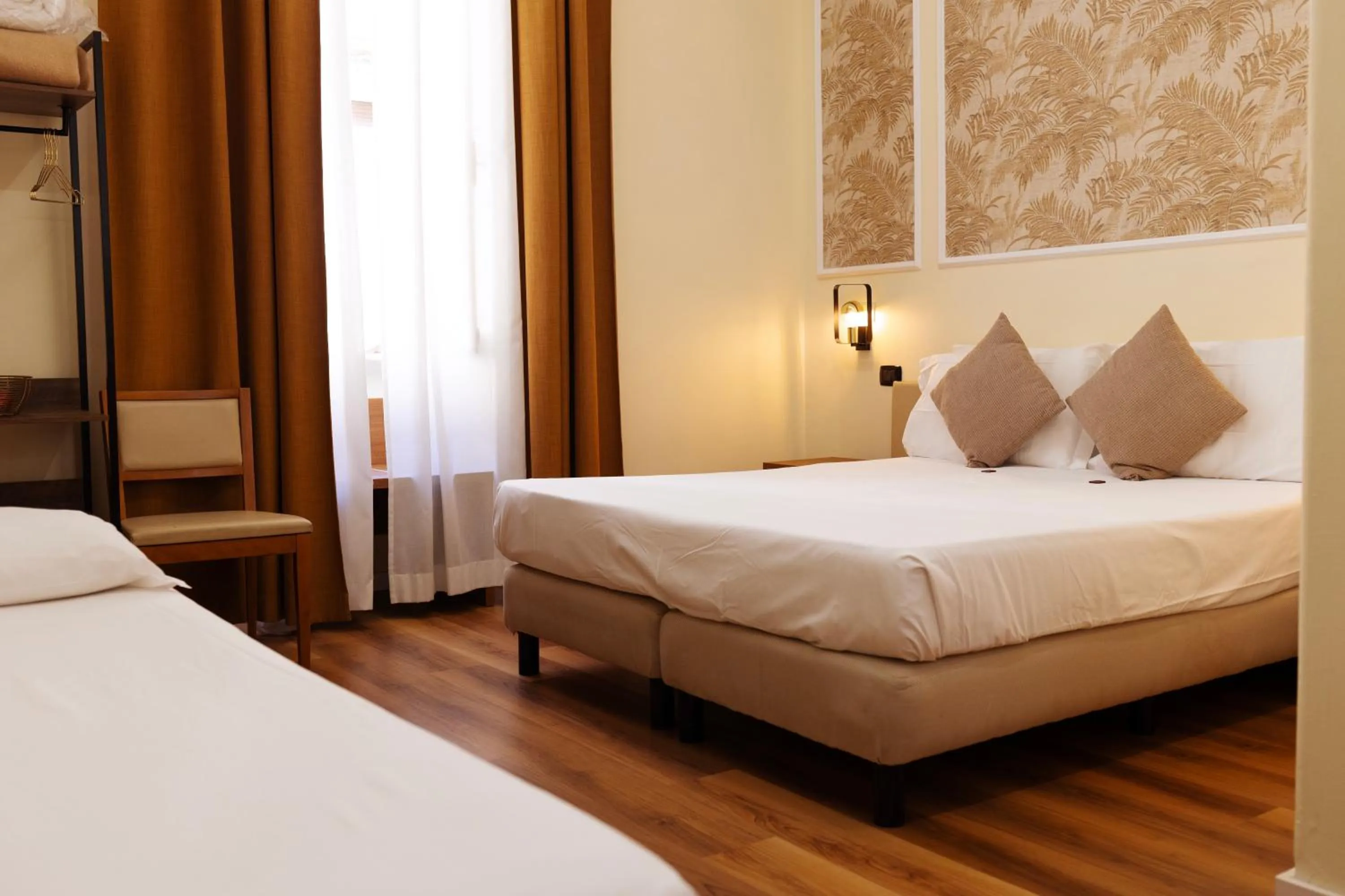 Bed in Hotel Giotto Flavia
