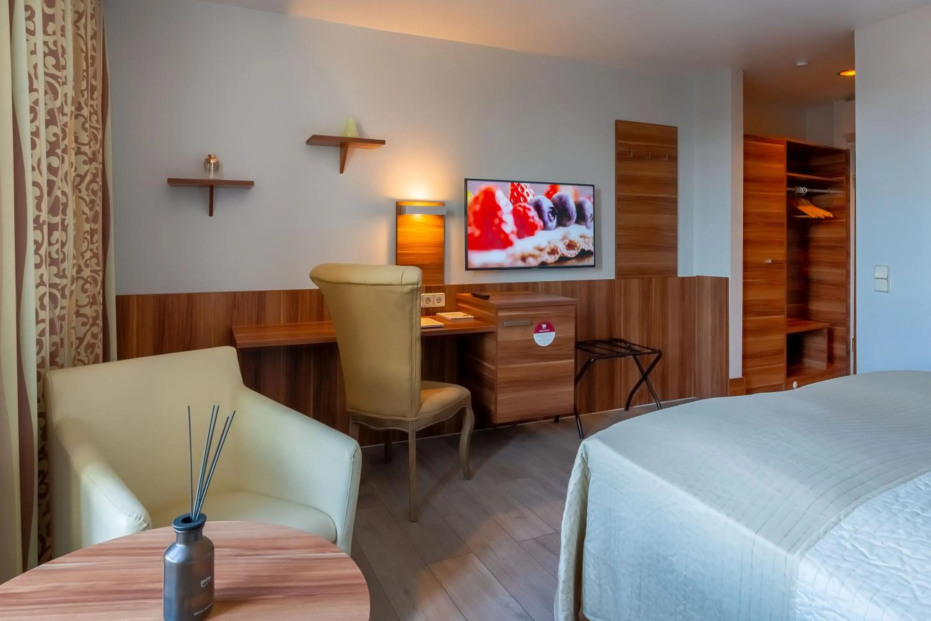 Seating area, Bed in Hotel Astor