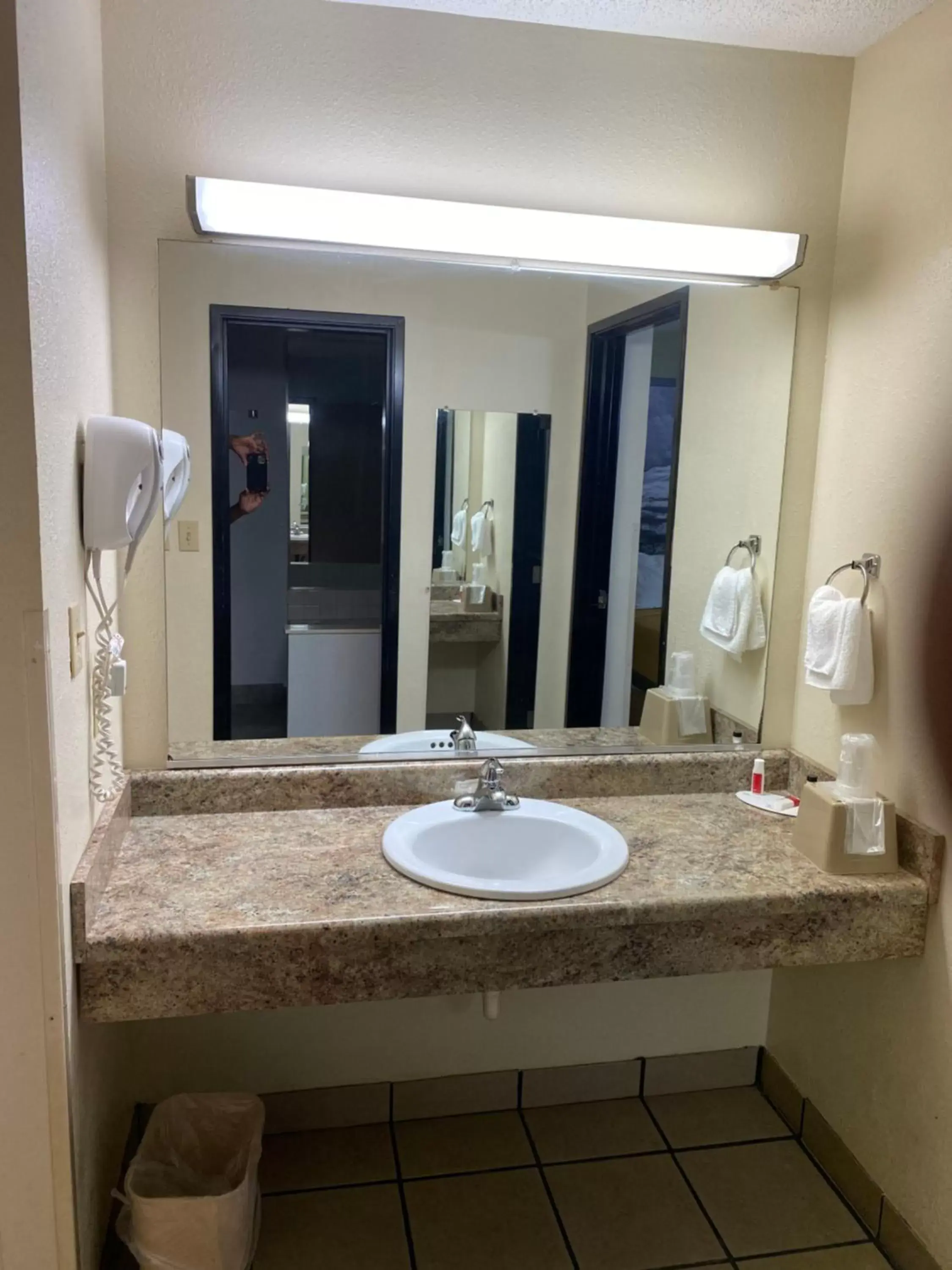 Bathroom in Super 8 by Wyndham Metropolis