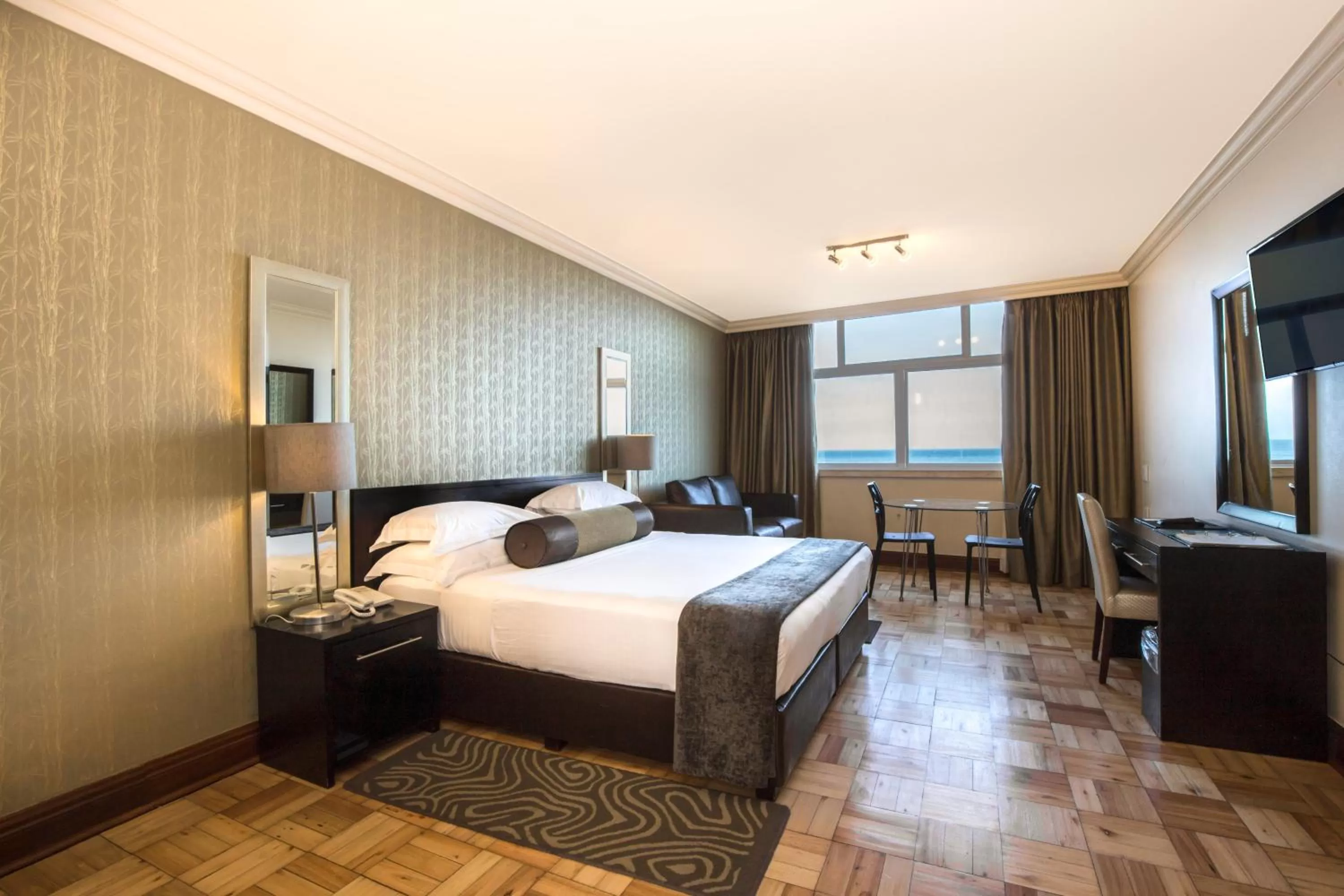 Bedroom, Bed in Belaire Suites Hotel