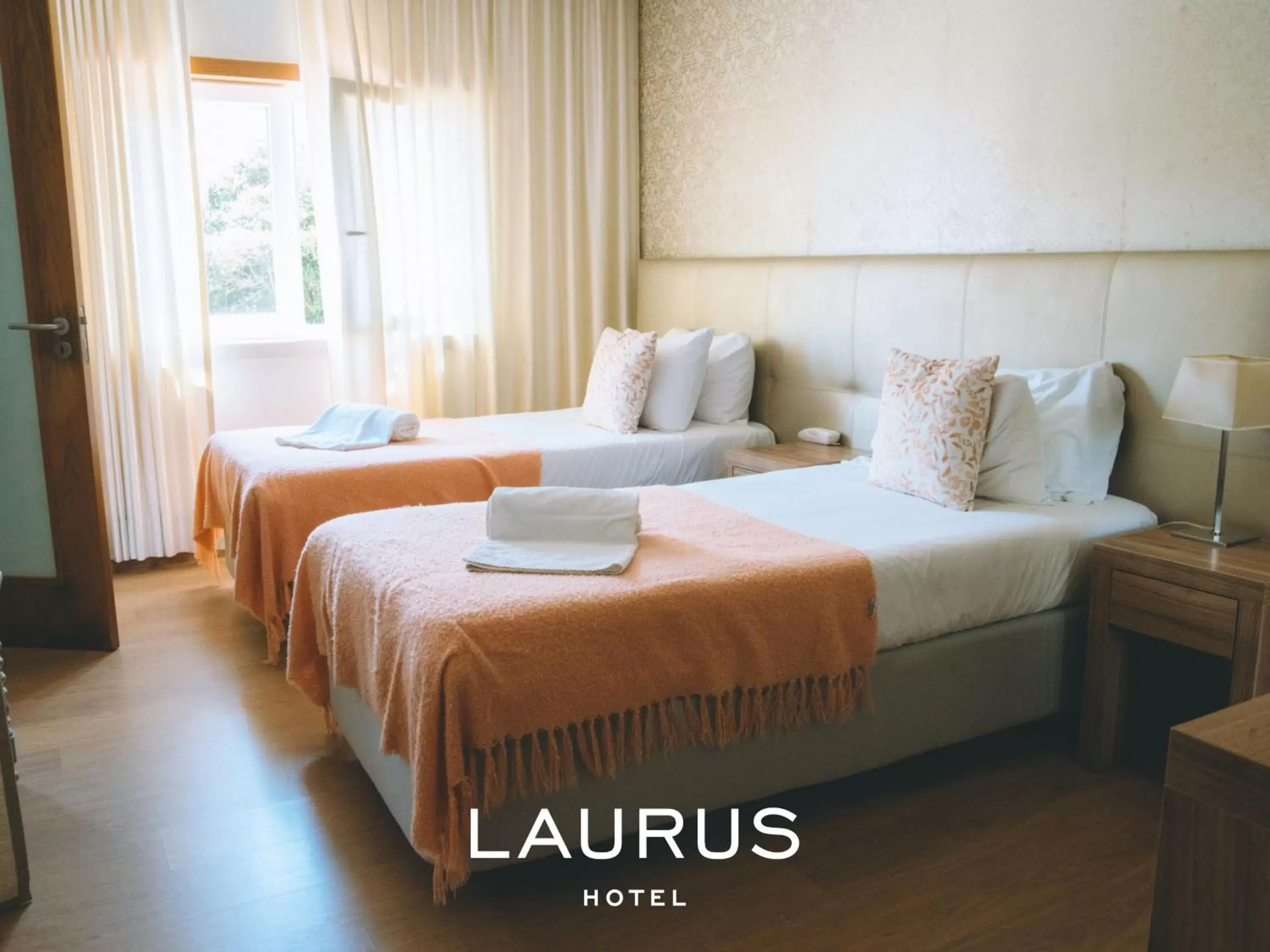 Bed in Laurus Hotel