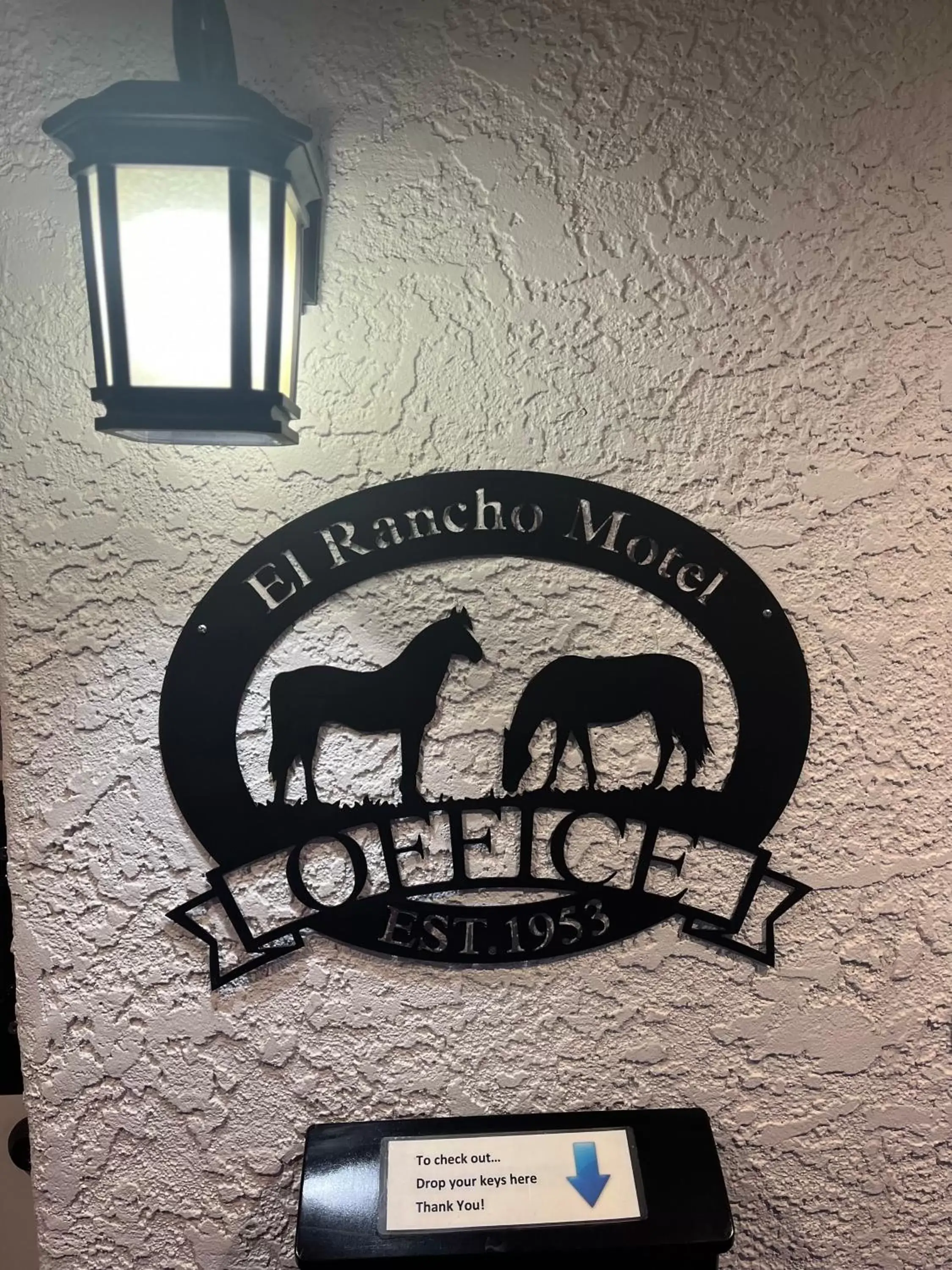 Property logo or sign in El Rancho Motel