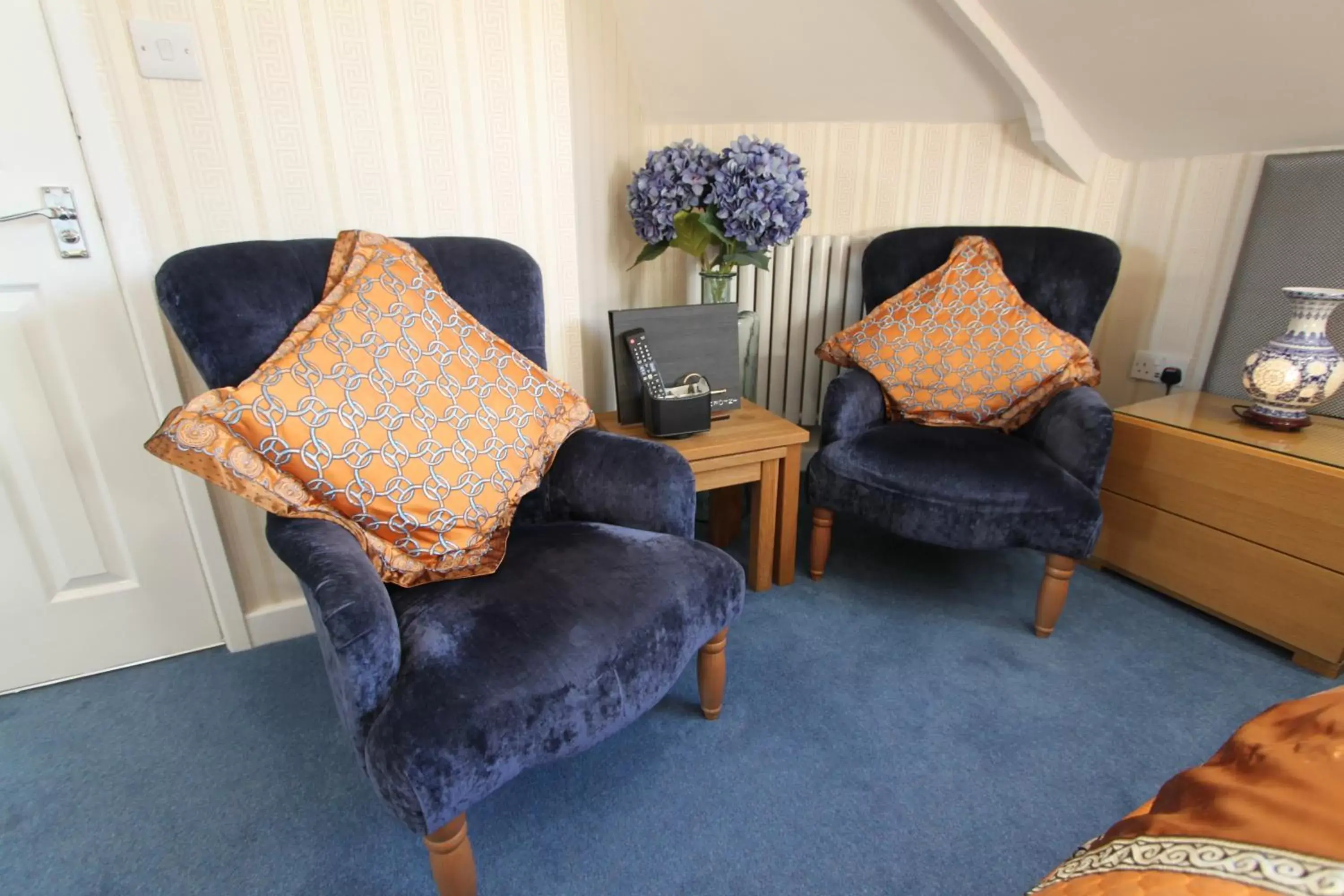 Bedroom, Seating Area in Tower Guest House