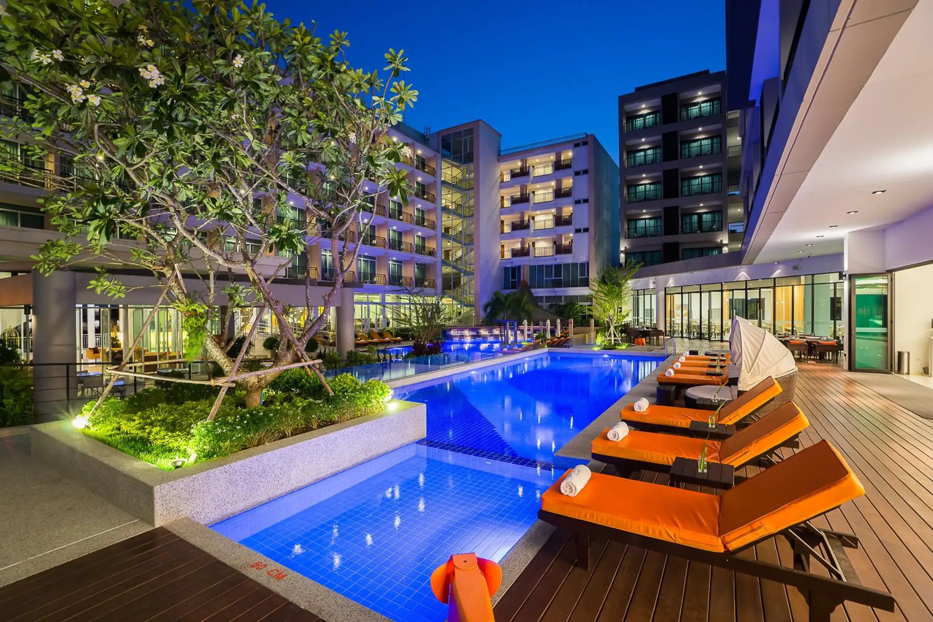 Swimming pool, Property Building in J Inspired Hotel Pattaya (SHA Plus)