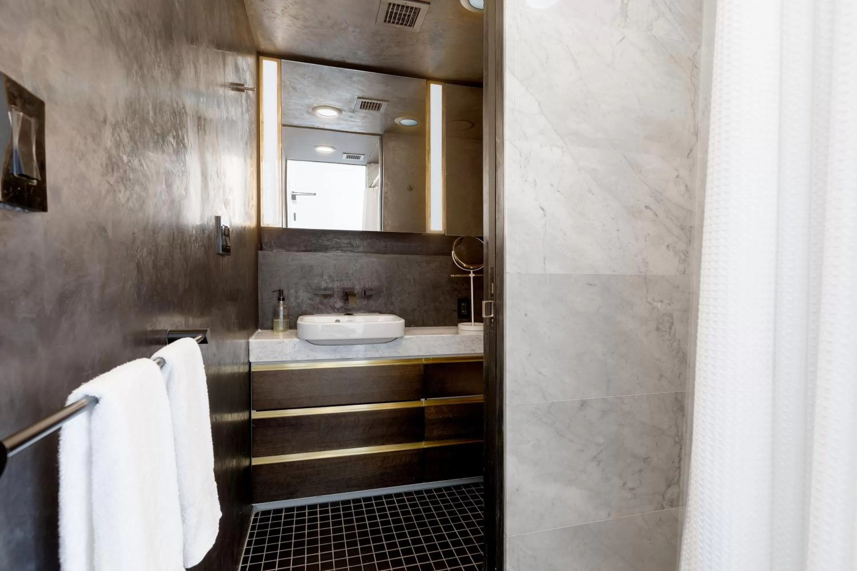 Shower in Placemakr Wall Street