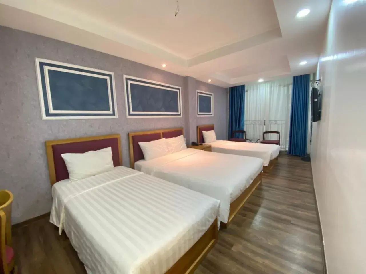 Bed in Holiday Suites Hotel & Spa