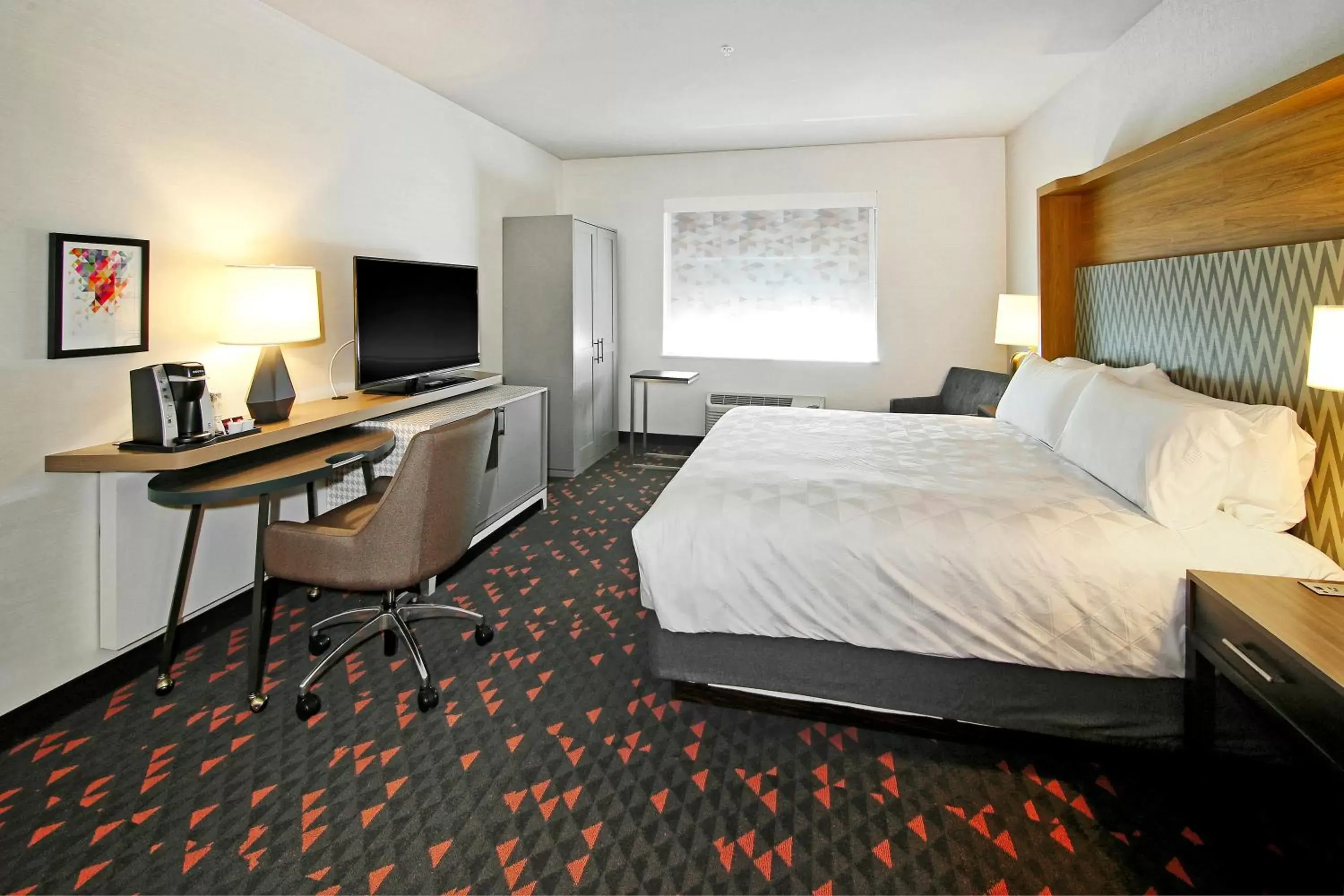 Photo of the whole room, Bed in Holiday Inn Hotel & Suites - Calgary Airport North, an IHG Hotel