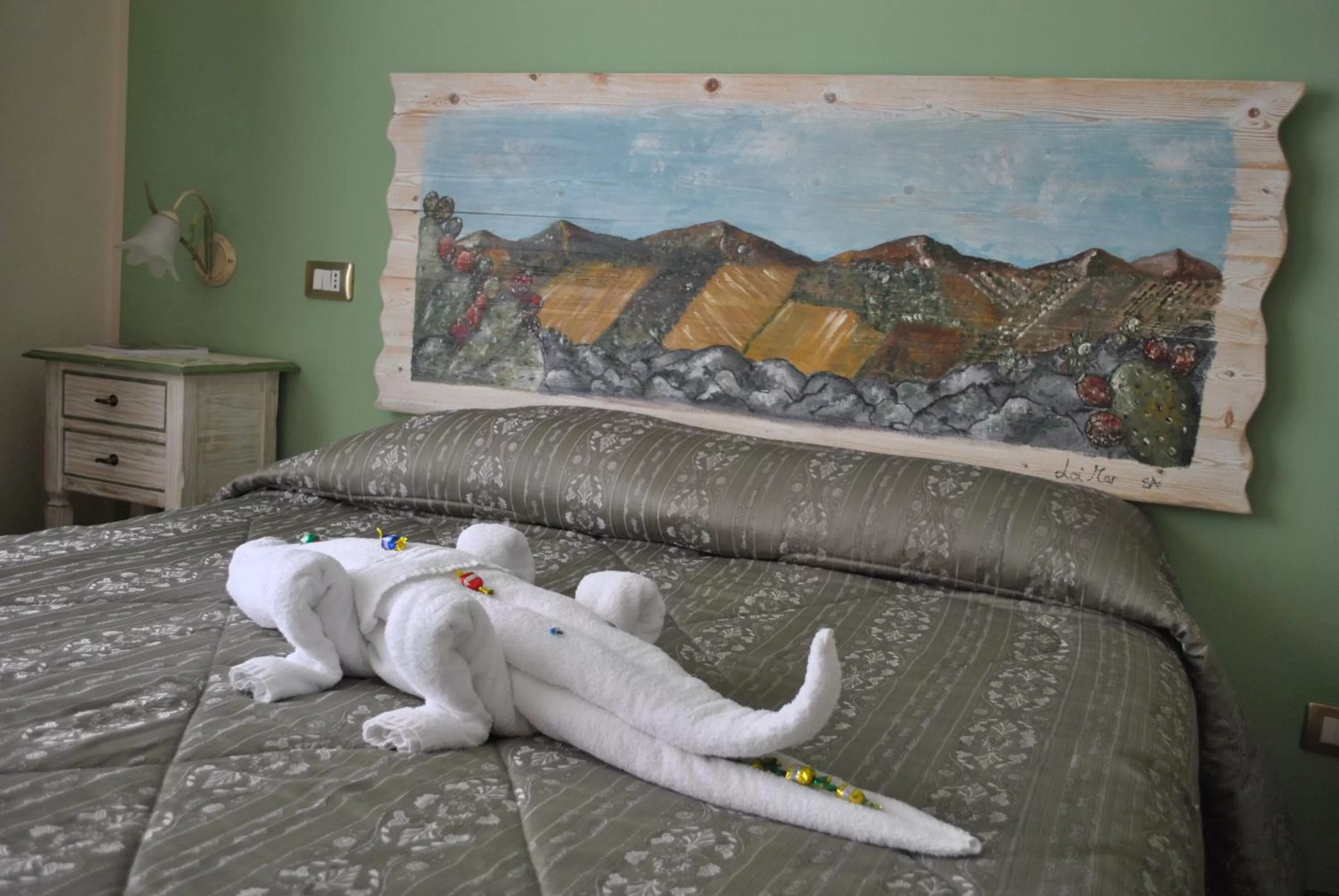 Decorative detail, Bed in Stupor Mundi Bed and Breakfast