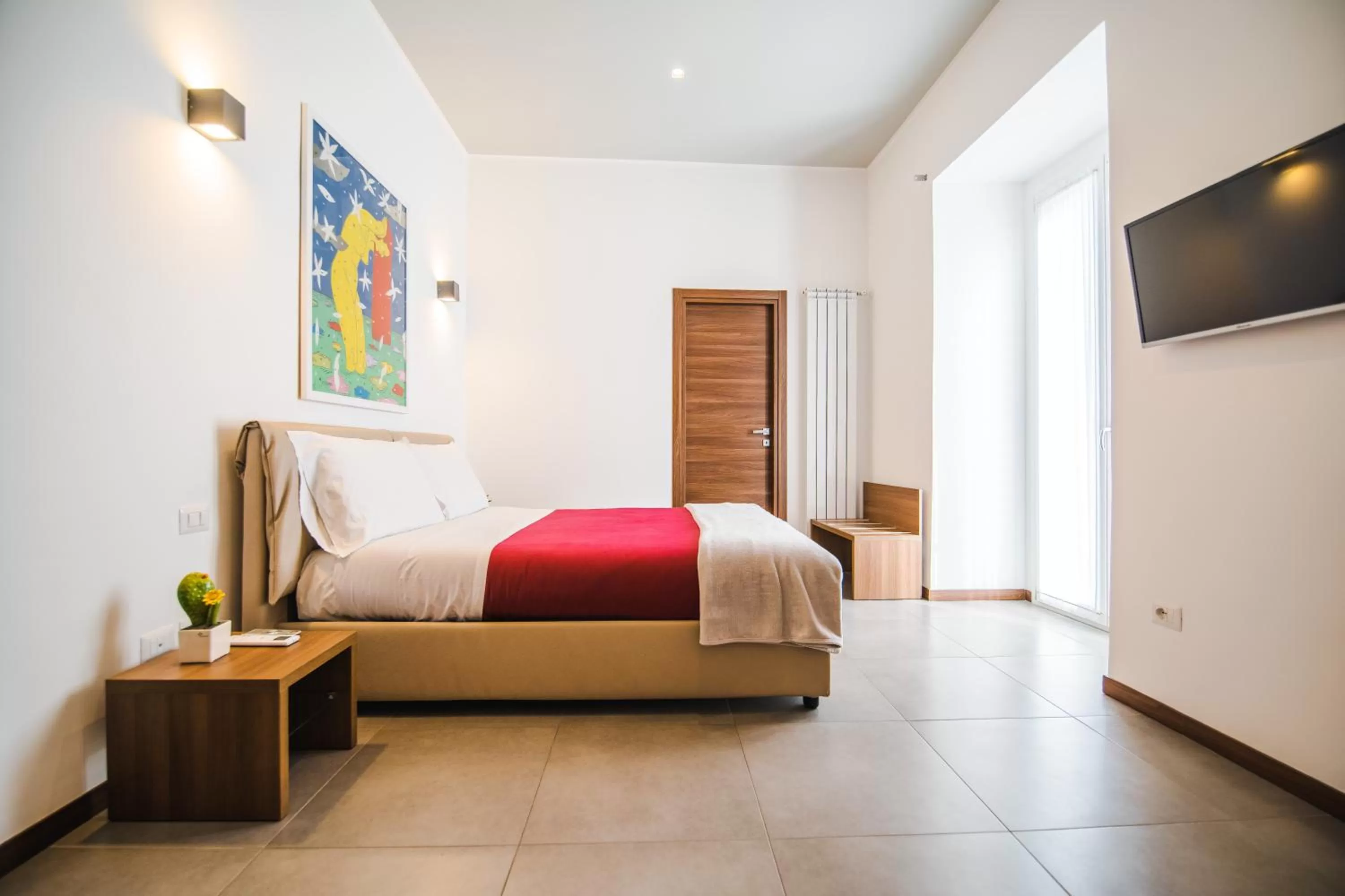 Photo of the whole room, Bed in Arco Dei Pinto