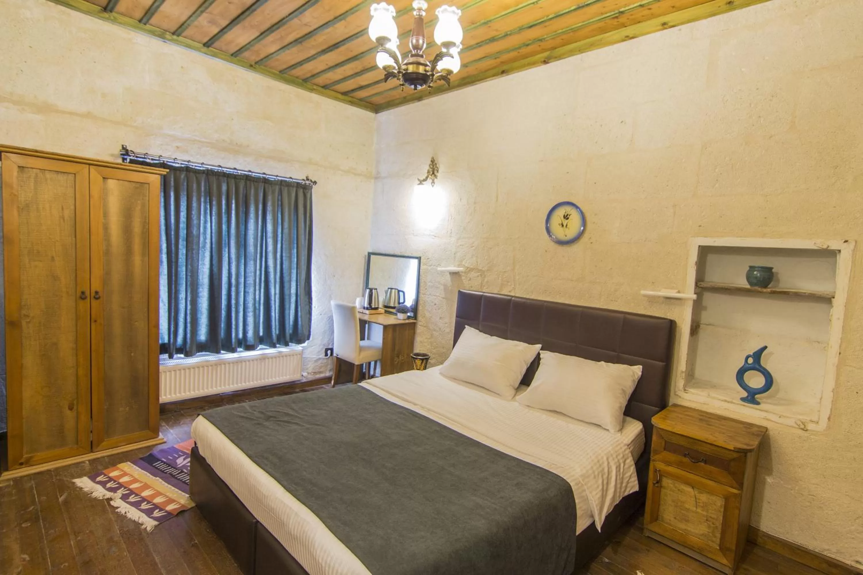 Bed in 7 Oda Kapadokya Cave Hotel