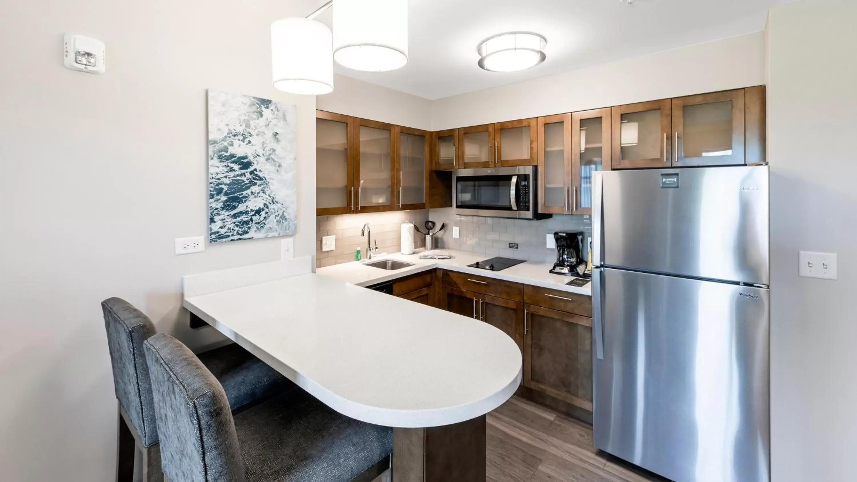 Bedroom, Kitchen/Kitchenette in Staybridge Suites - Naples - Marco Island, an IHG Hotel