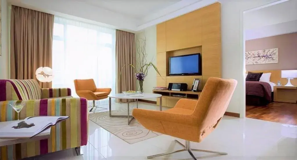 TV and multimedia, Seating Area in Cormar Suites