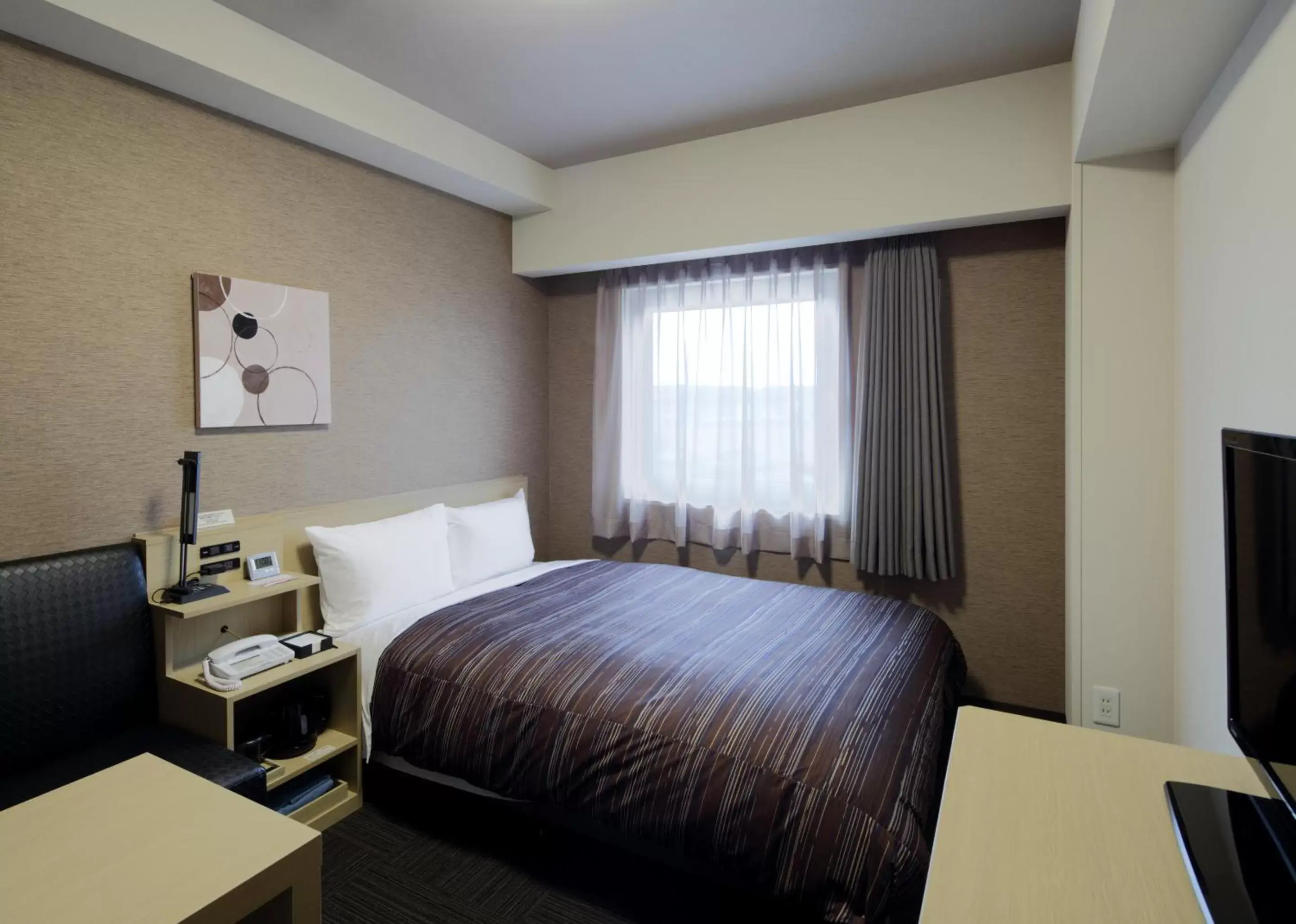 Photo of the whole room, Bed in Hotel Route-Inn Tsuyama Ekimae