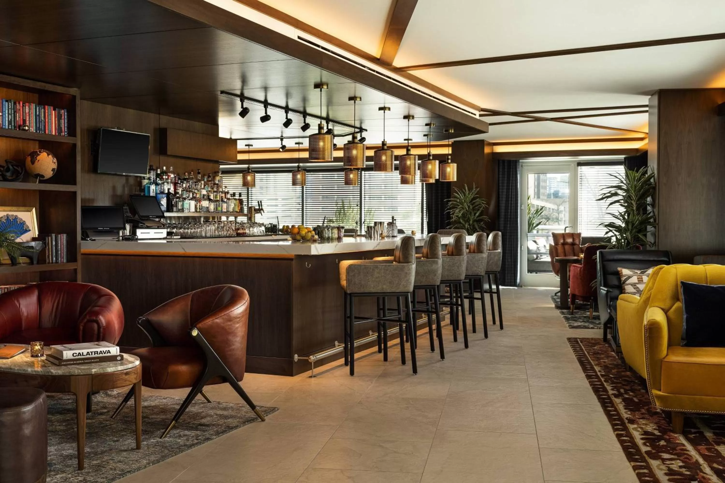 Lounge or bar in AC Hotel by Marriott Austin-University