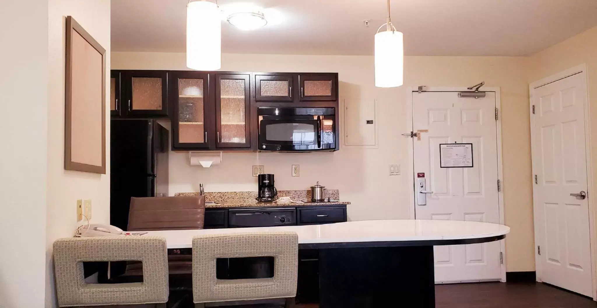 Photo of the whole room, Kitchen/Kitchenette in Candlewood Suites Houston Medical Center, an IHG Hotel