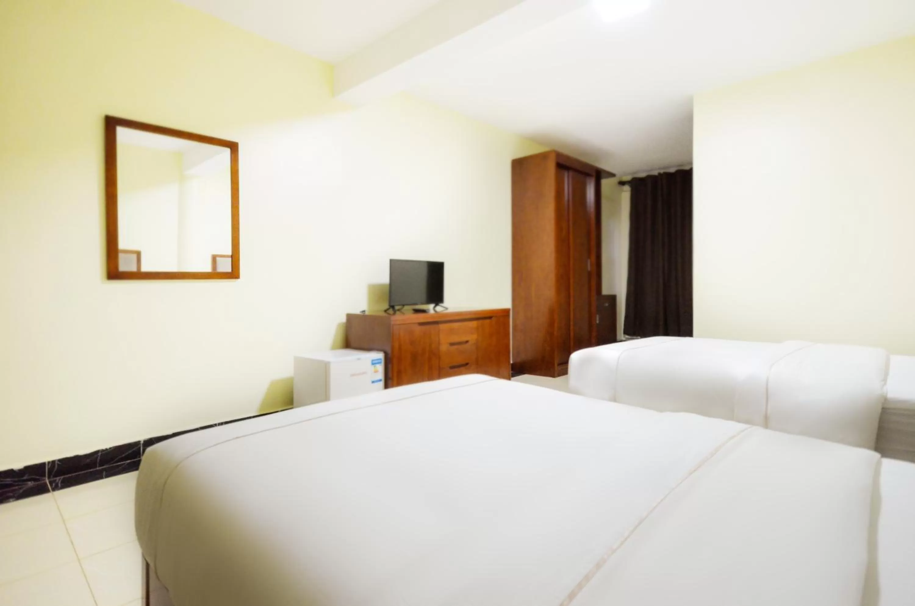 Bed in Igar Plaza Hotel