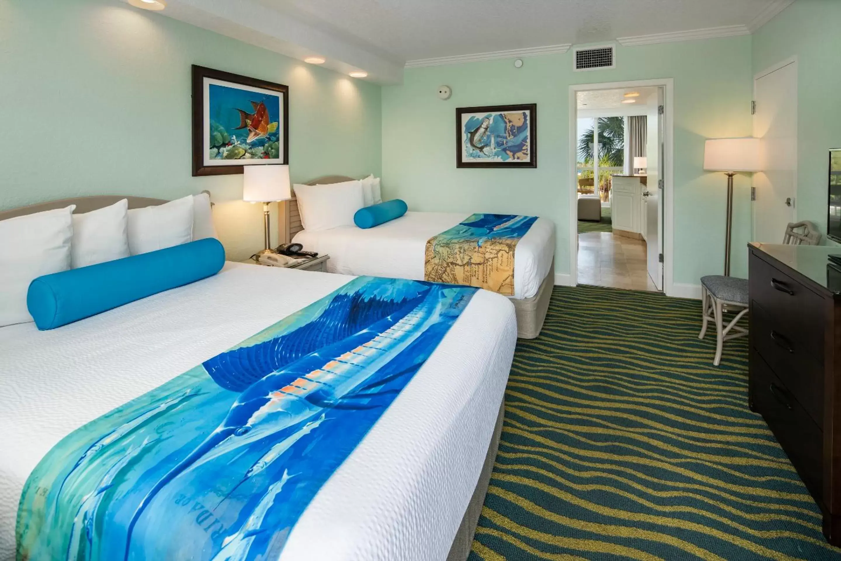 Bed in RumFish Beach Resort by TradeWinds