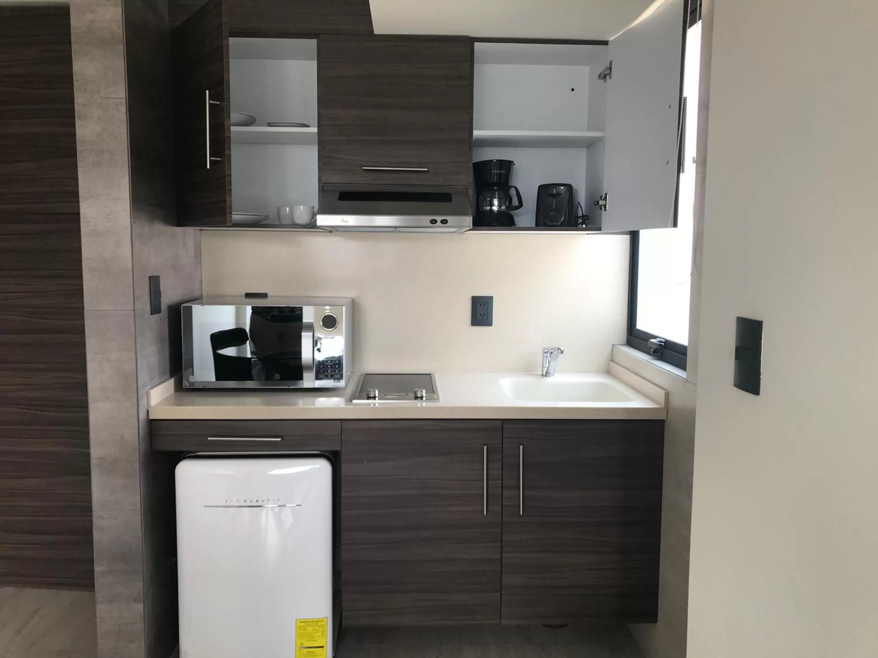 Kitchen or kitchenette in MC Suites Mexico City
