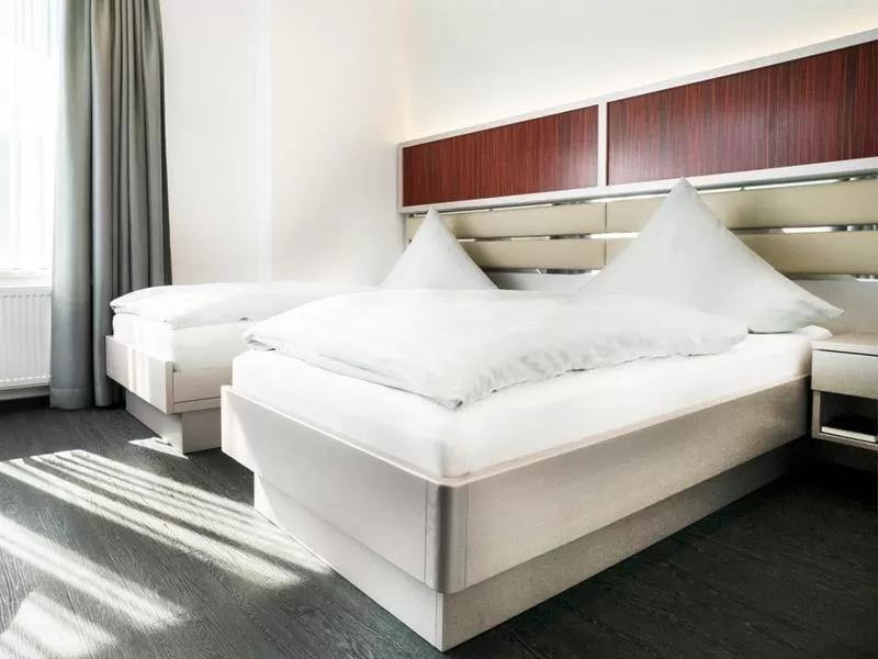 Bed in Hennedamm Hotel