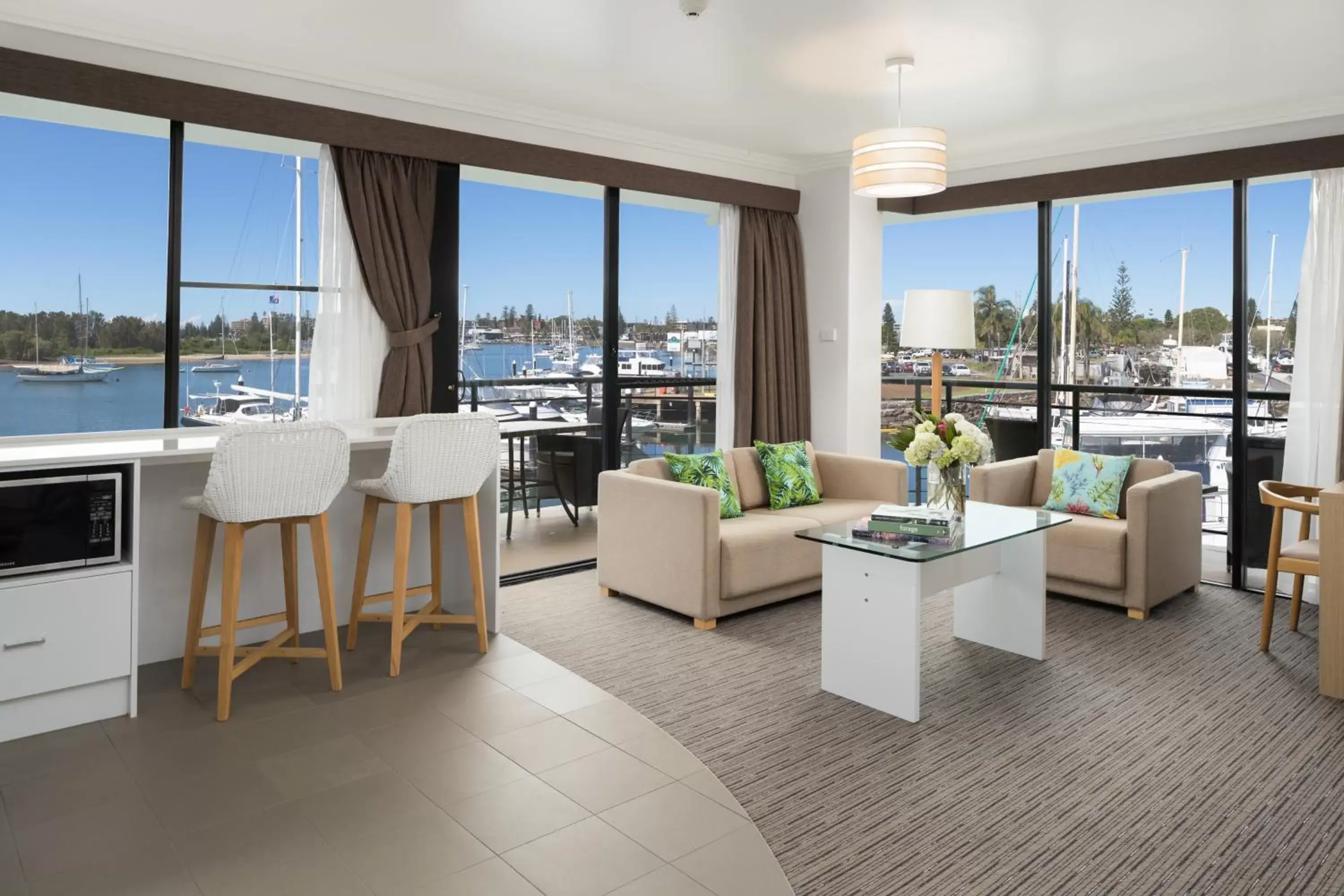 Living room in Sails Port Macquarie by Rydges