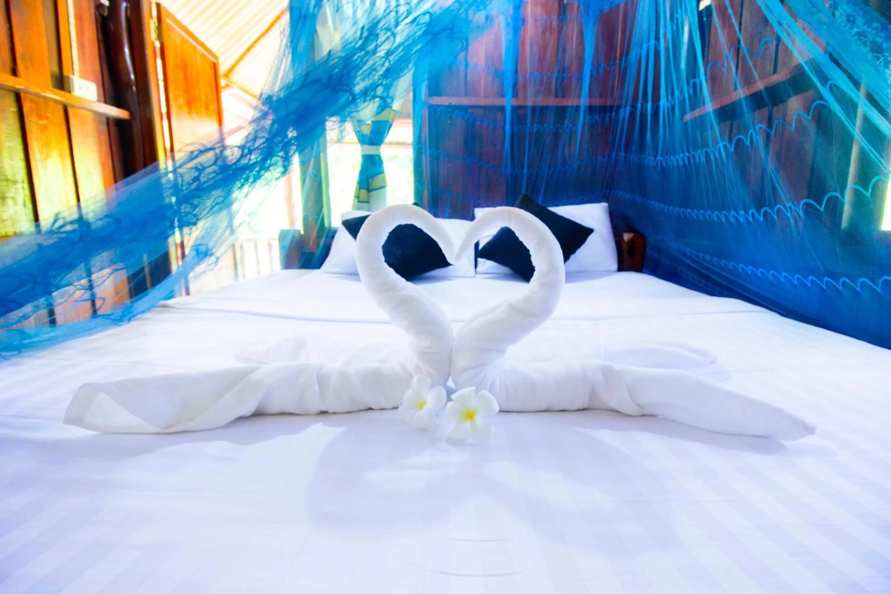 Bed in Khao Sok Palmview Resort