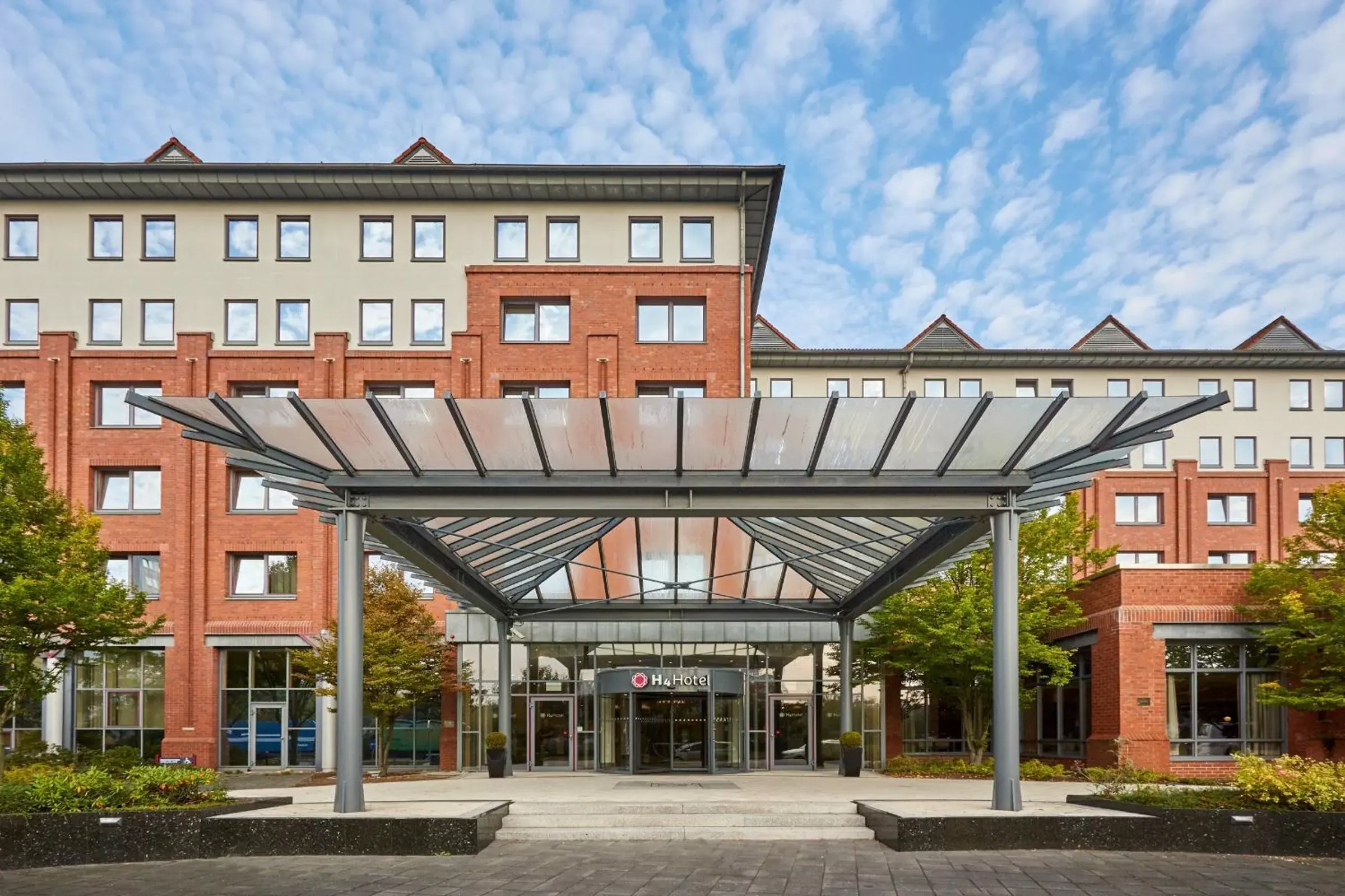 Facade/entrance in H4 Hotel Hannover Messe, Trademark Collection by Wyndham Facade/entrance in H4 Hotel Hannover Messe, Trademark Collection by Wyndham
