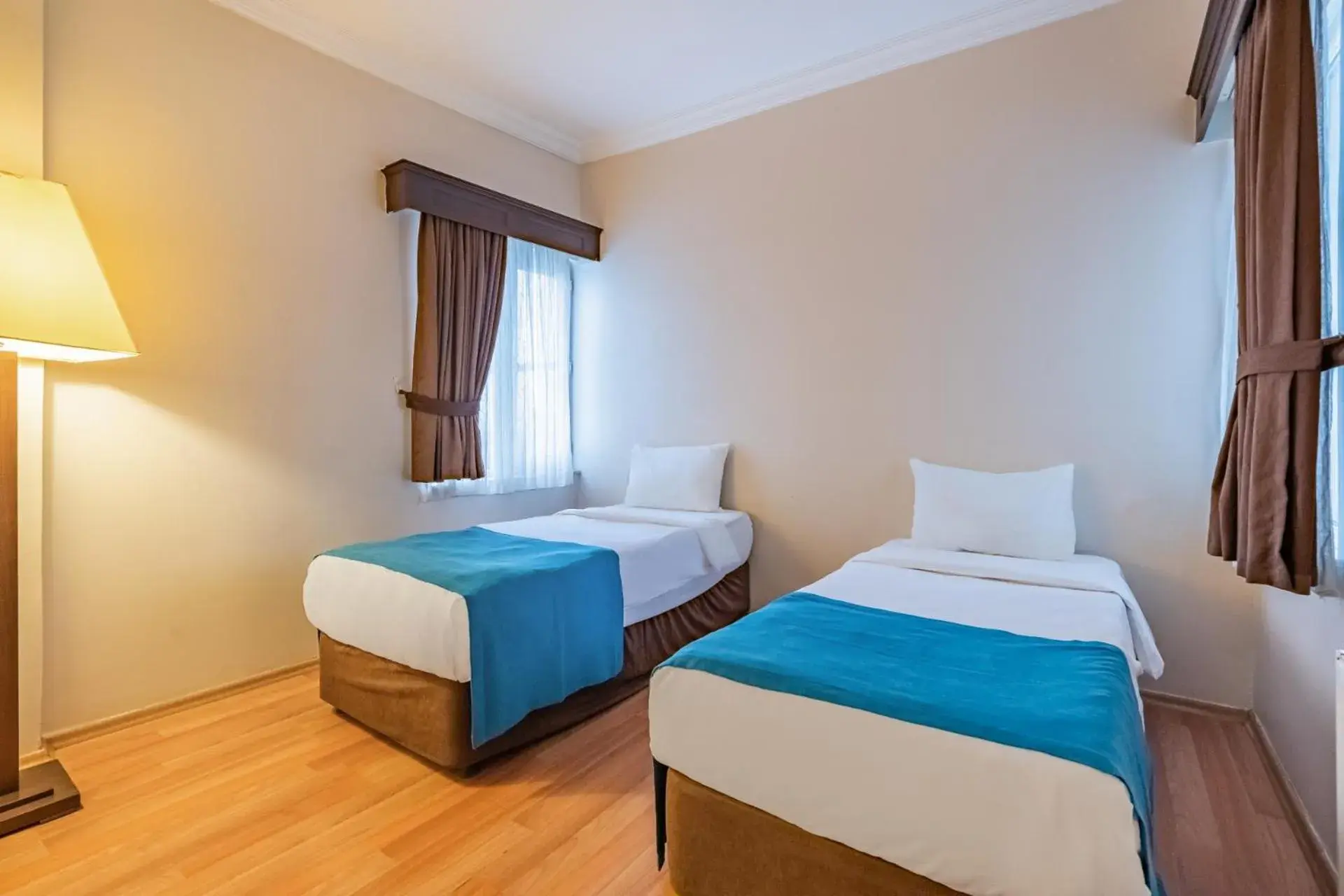 Bed in Buyuk Velic Hotel