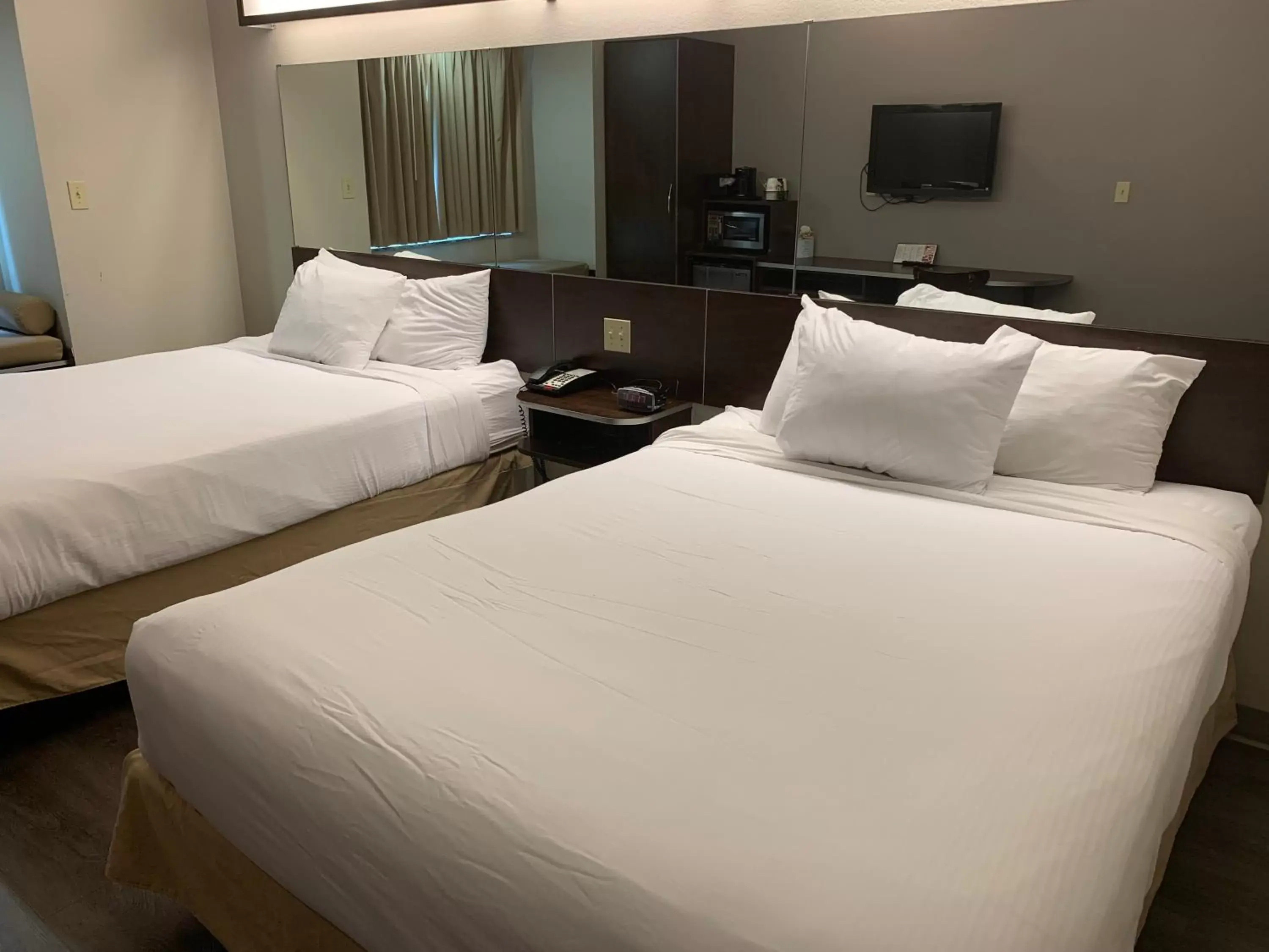 Photo of the whole room, Bed in Microtel Inn & Suites by Wyndham Pearl River/Slidell Photo of the whole room, Bed in Microtel Inn & Suites by Wyndham Pearl River/Slidell