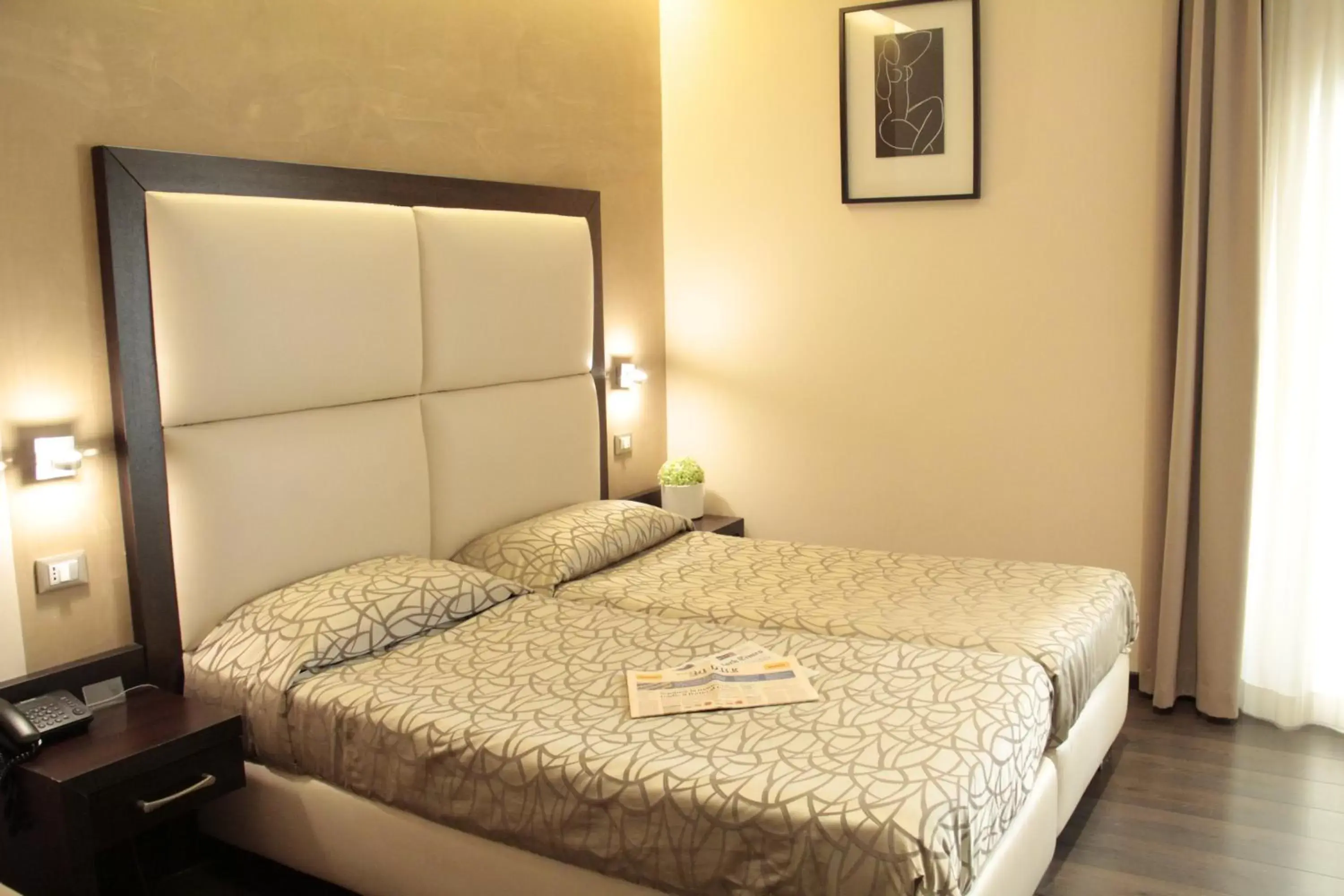 Photo of the whole room, Bed in Catone District Hotel