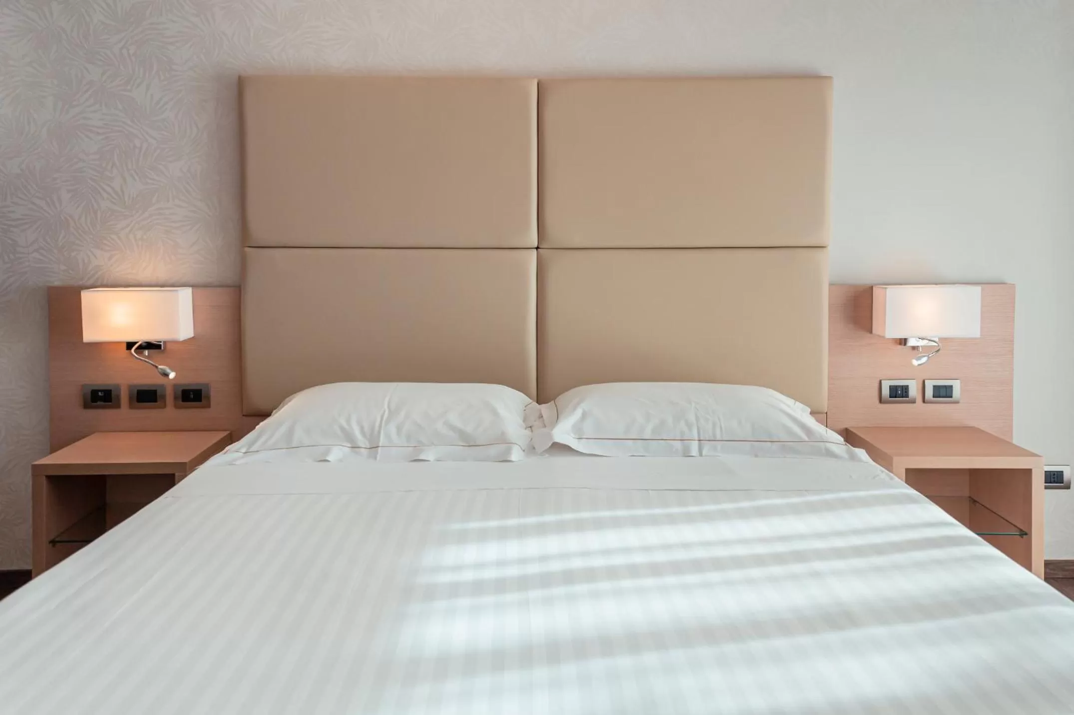 Bed in Hotel Continental