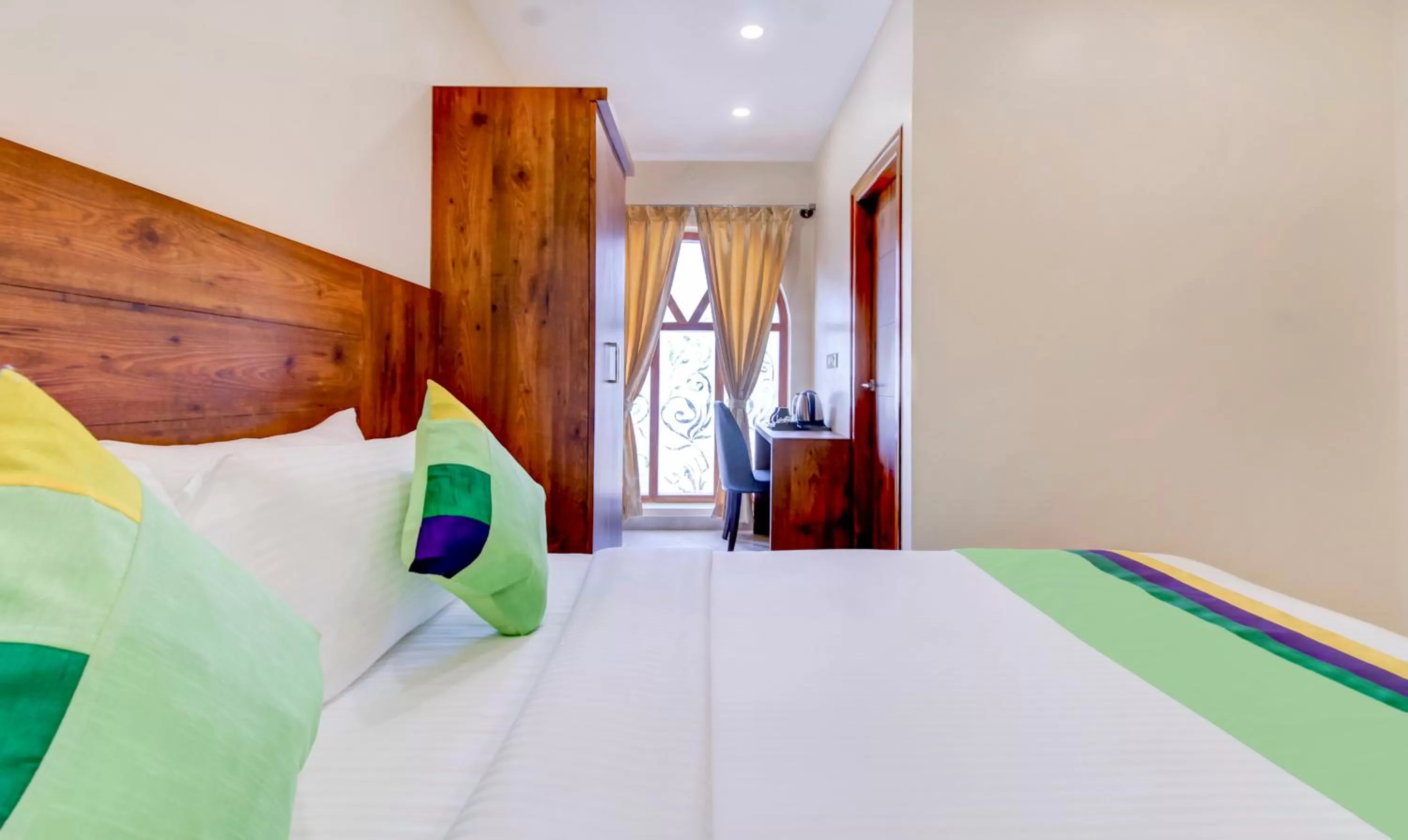 Bedroom, Bed in Treebo The Meridian