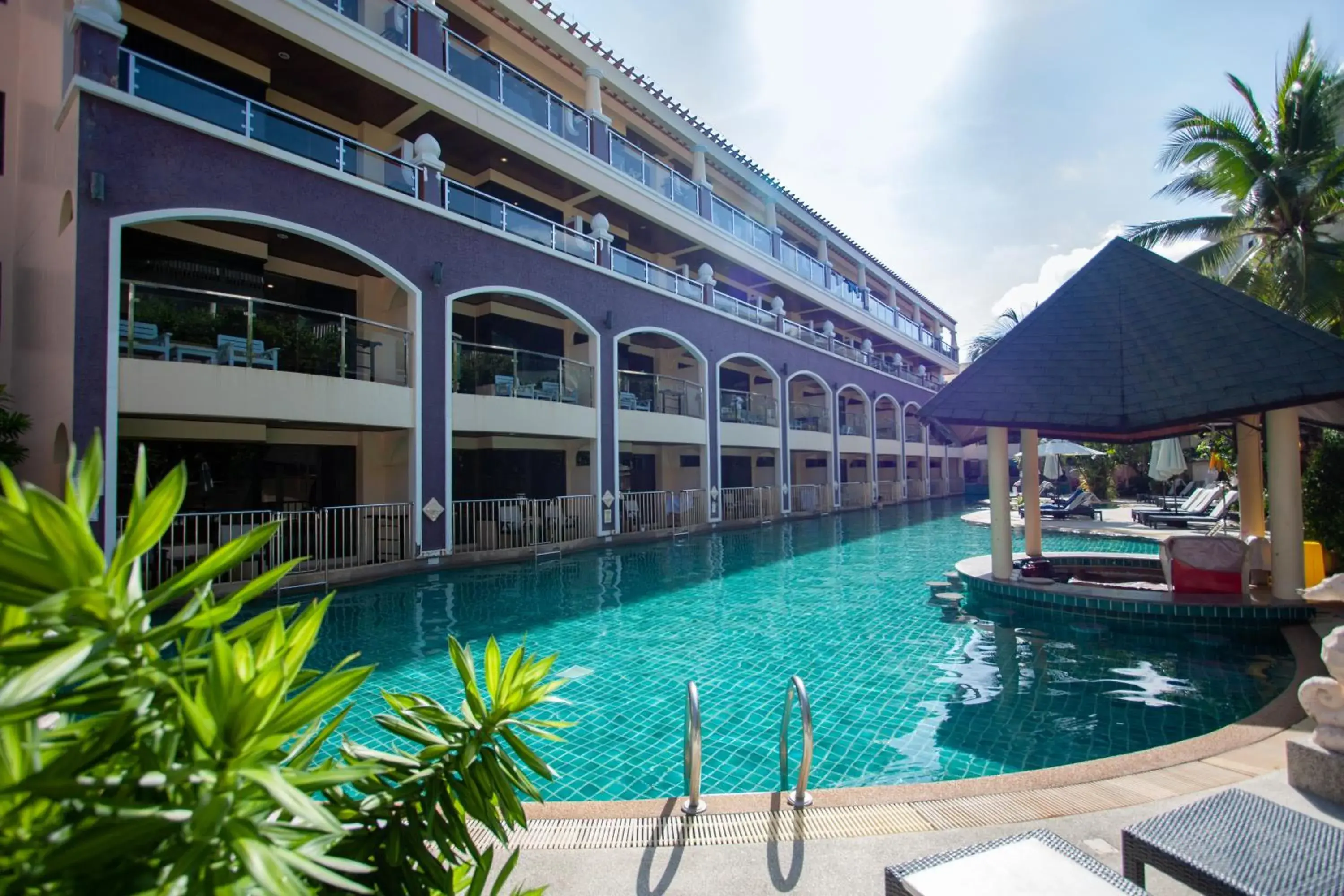 Swimming pool in Karon Sea Sands Resort-SHA PLUS Swimming pool in Karon Sea Sands Resort-SHA PLUS