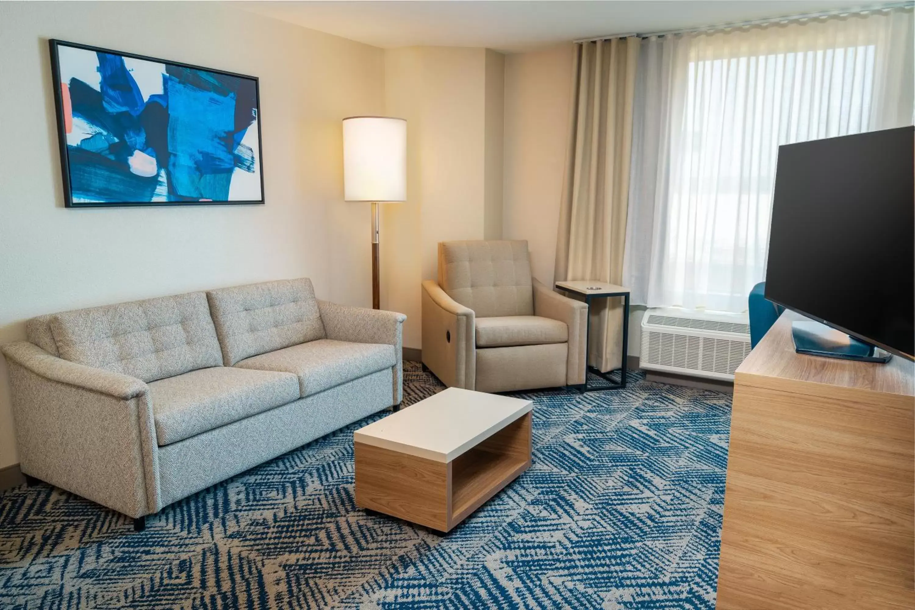 Communal lounge/ TV room, TV/Entertainment Center in Candlewood Suites - Las Vegas - E Tropicana, an IHG Hotel