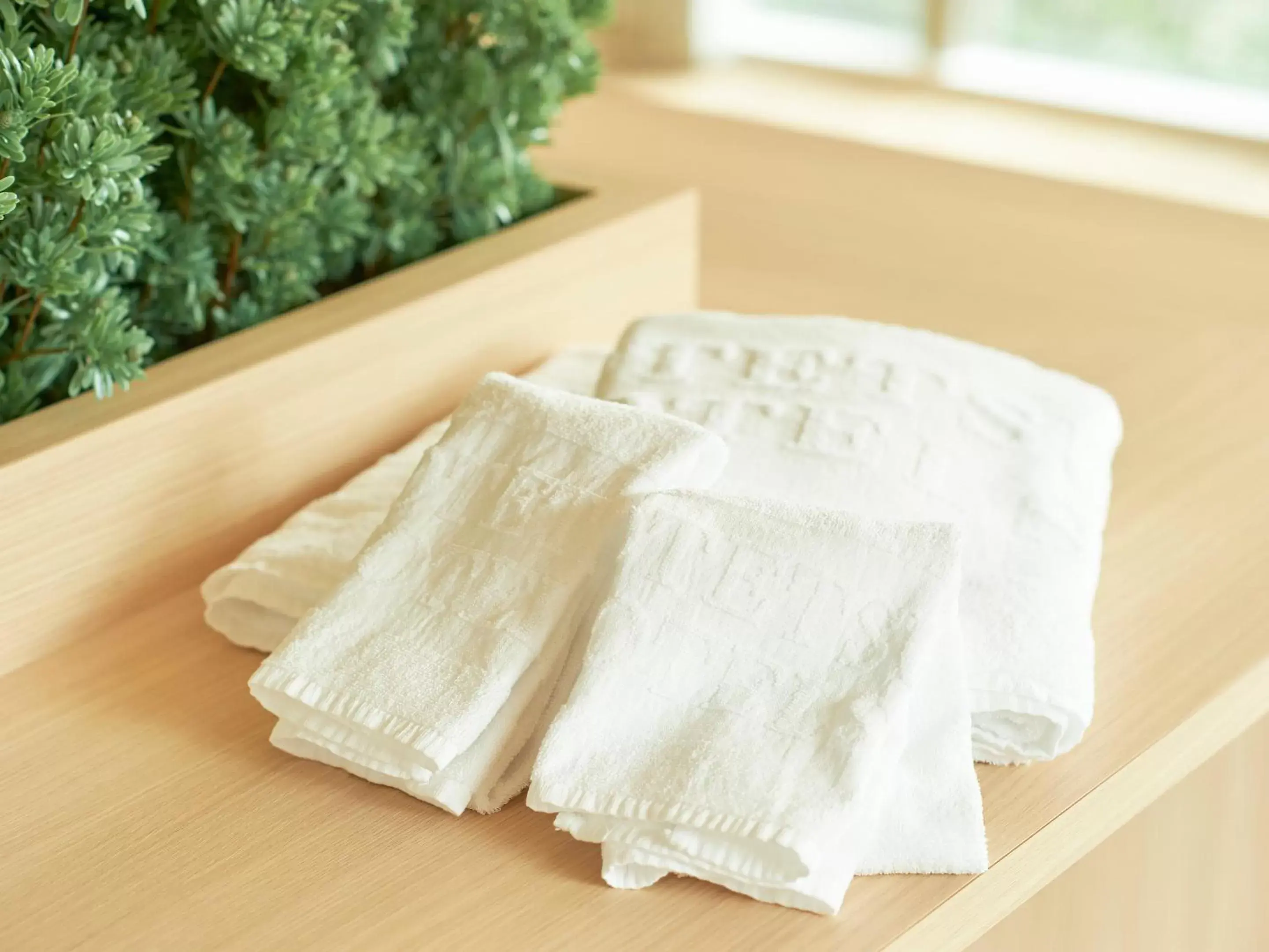 towels, Bed in Sotetsu Fresa Inn Kobe Sannomiya