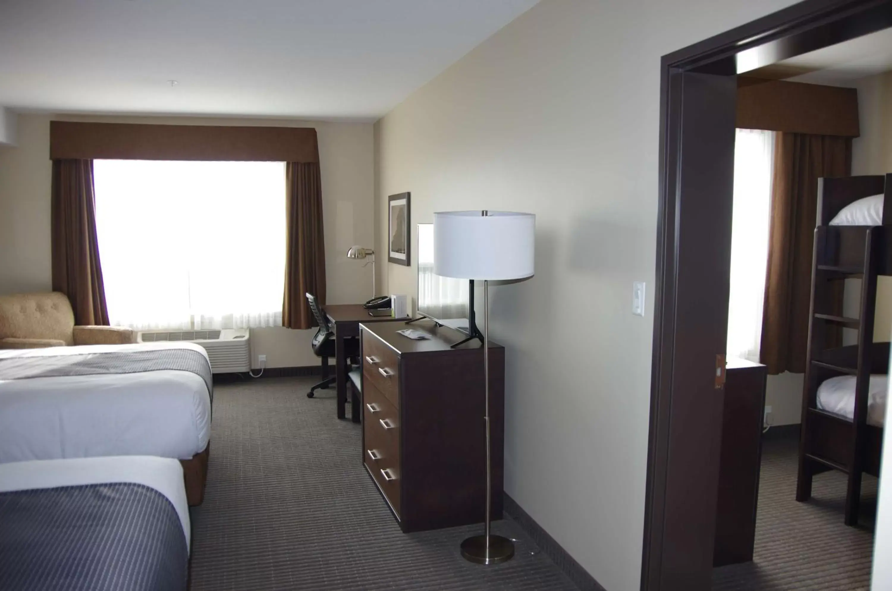 Photo of the whole room, TV/Entertainment Center in Best Western Plus Lacombe Inn and Suites