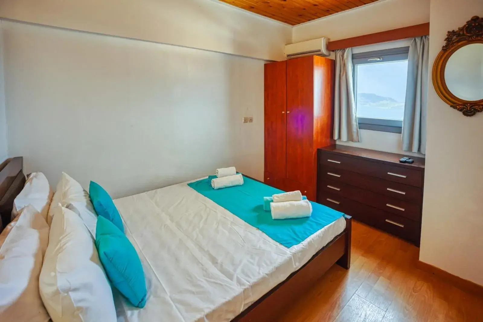 Bed in Elounda Water Park Residence Hotel