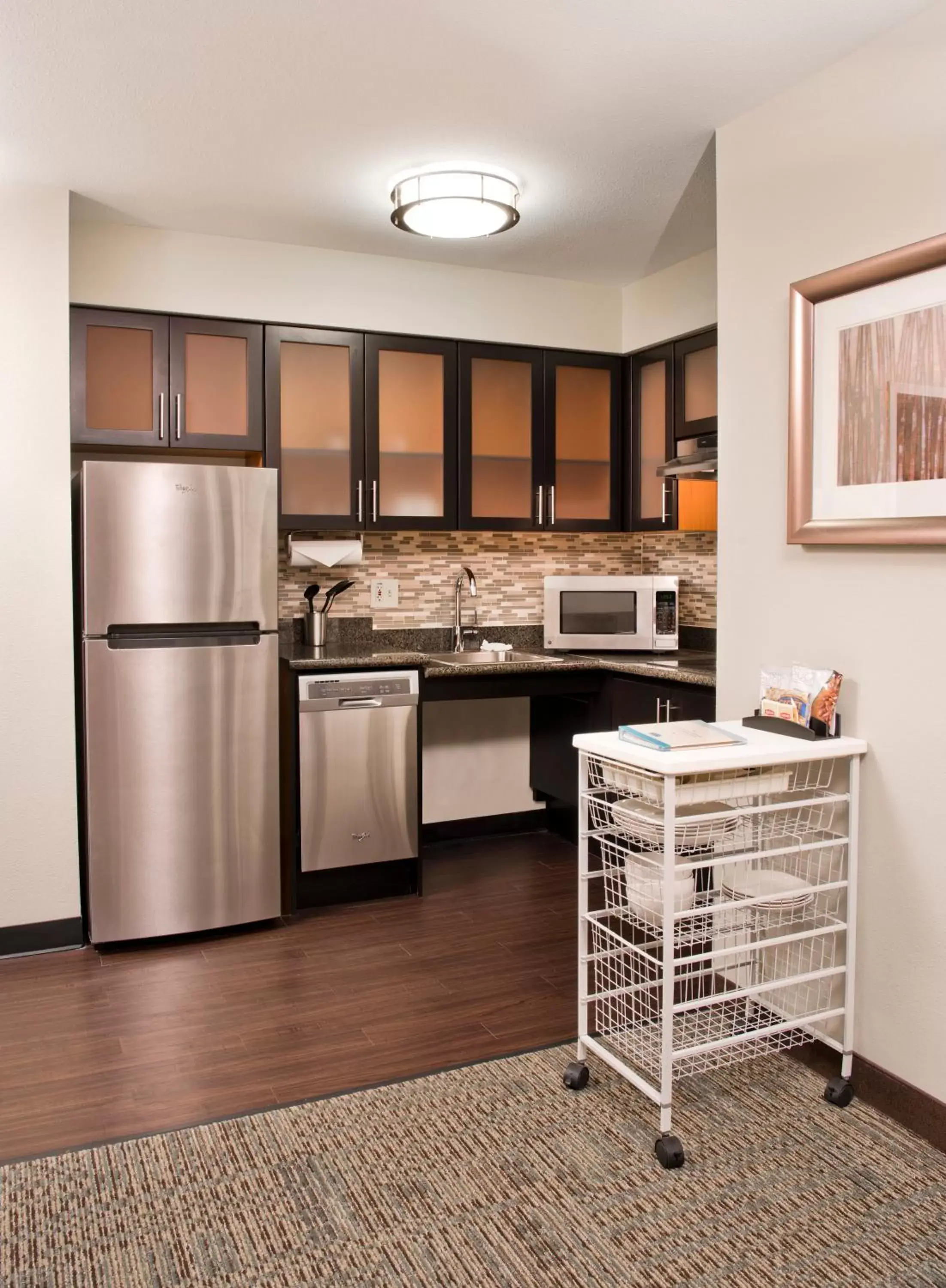 Kitchen/Kitchenette in Staybridge Suites - Charlotte Ballantyne, an IHG Hotel