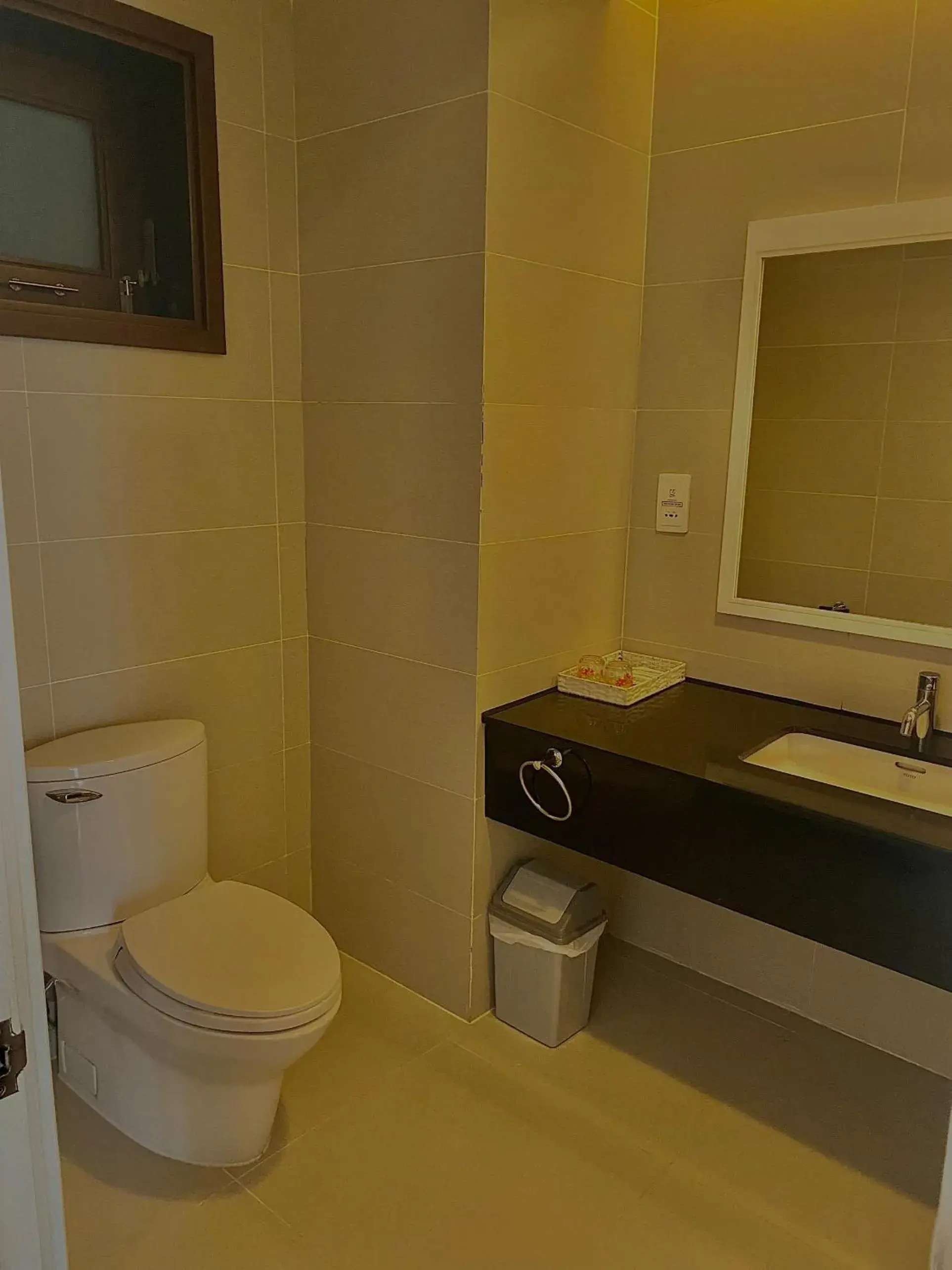 Bathroom in Nhi Phi Hotel
